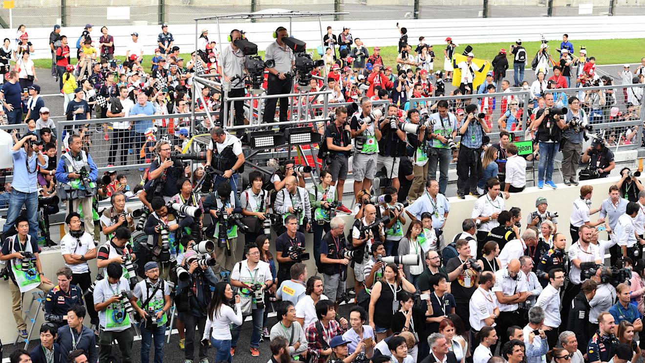 Photographers at Formula One World Championship, Rd17, Japanese Grand Prix, Race, Suzuka, Japan, Sunday 9 October 2016. © Sutton Images