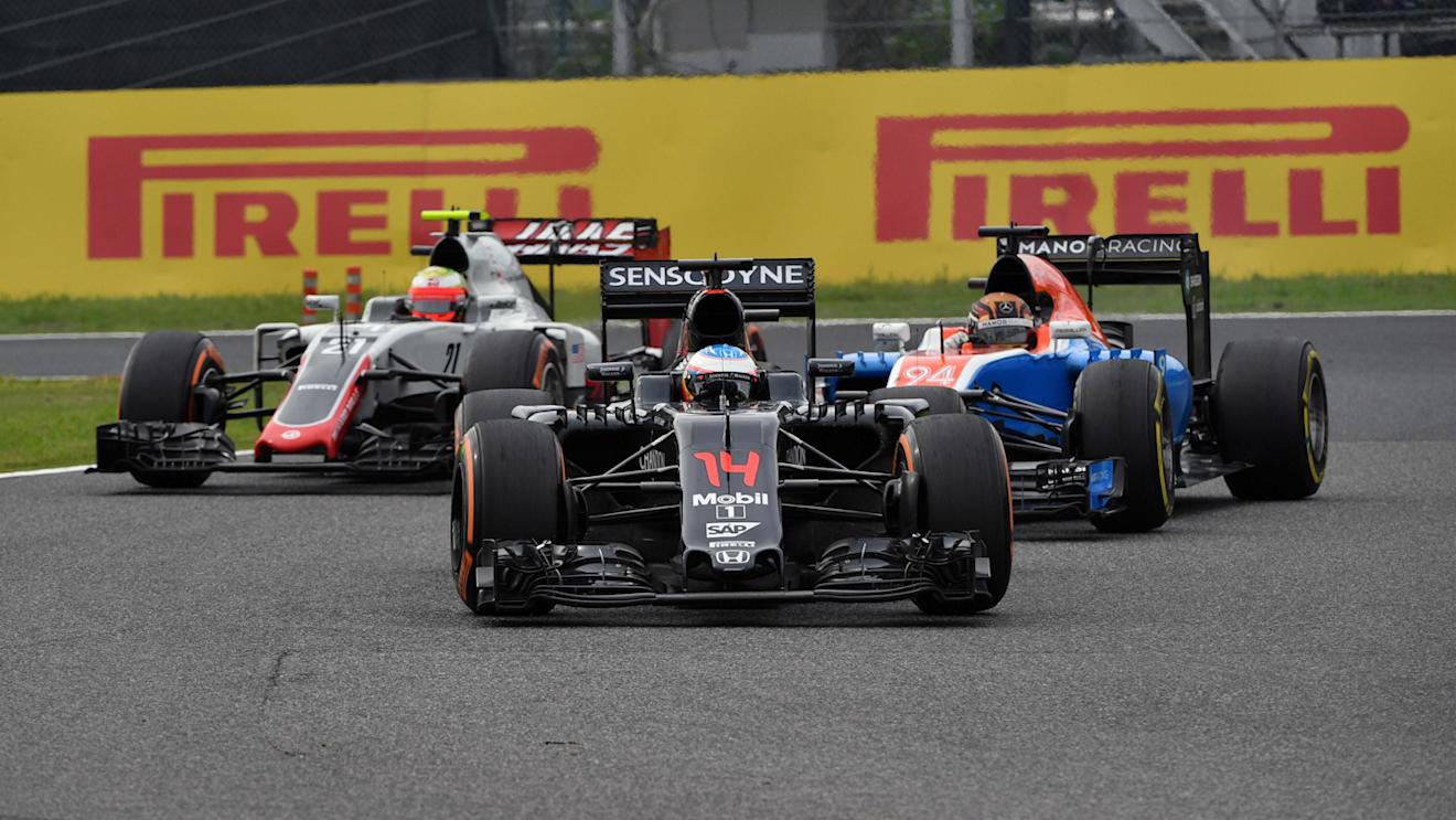 Fernando Alonso (ESP) McLaren MP4-31, Pascal Wehrlein (GER) Manor Racing MRT05 and Esteban Gutierrez (MEX) Haas VF-16 at Formula One World Championship, Rd17, Japanese Grand Prix, Race, Suzuka, Japan, Sunday 9 October 2016. © Sutton Images