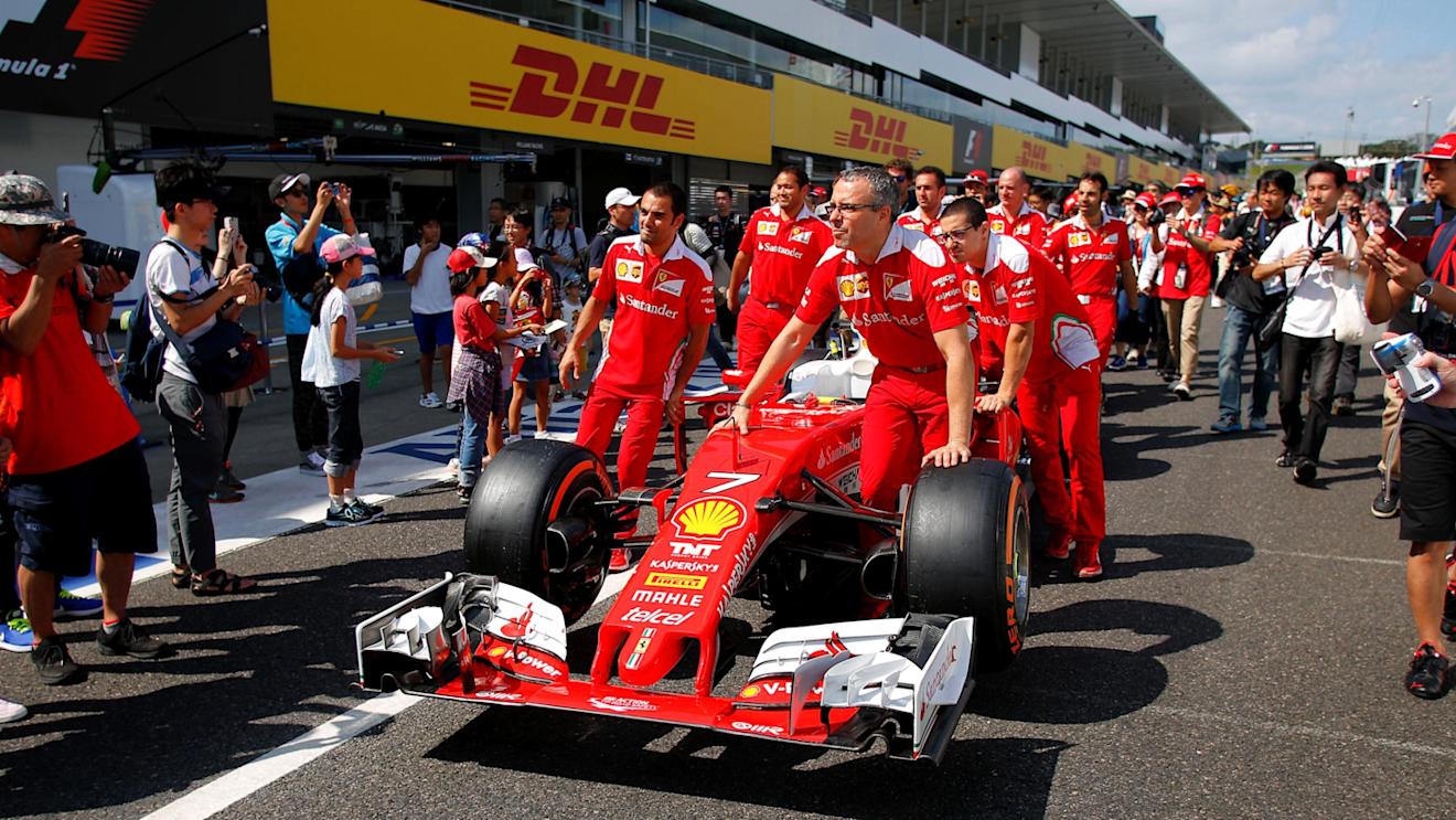 Ferrari mechanics with Ferrari SF16-H in pit lane at Formula One World Championship, Rd17, Japanese Grand Prix, Preparations, Suzuka, Japan, Thursday 6 October 2016. © Sutton Images