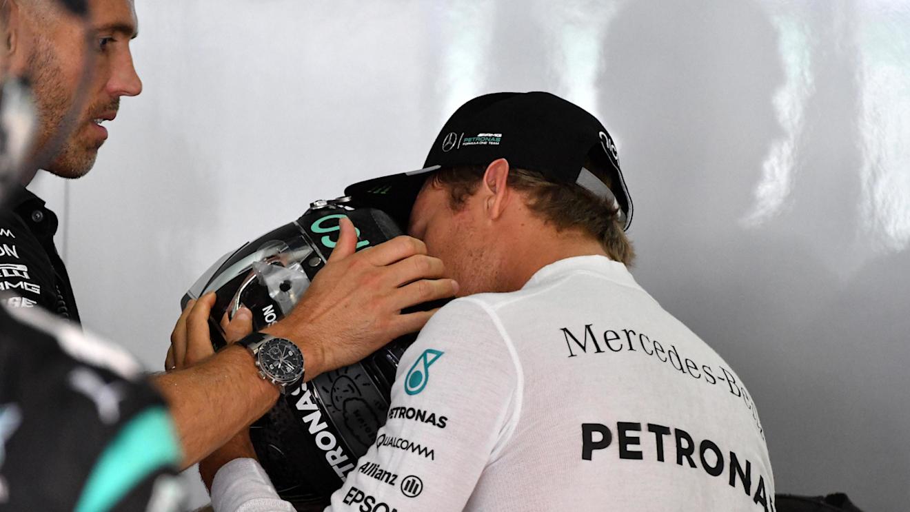 Nico Rosberg (GER) Mercedes AMG F1 with his trainer Daniel Schloesser (GER) at Formula One World Championship, Rd16, Malaysian Grand Prix, Qualifying, Sepang, Malaysia, Saturday 1 October 2016. © Sutton Images