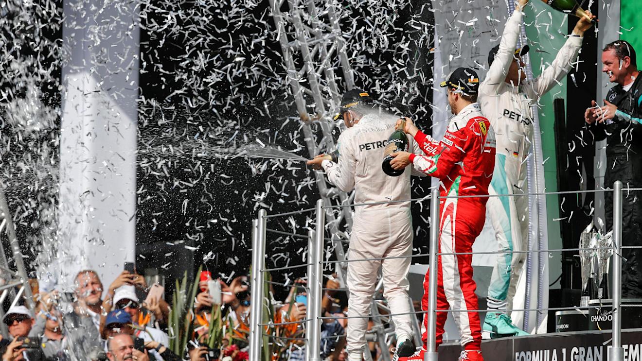 Tom Walton (GBR) Mercedes AMG F1 Engineer, Nico Rosberg (GER) Mercedes AMG F1, Lewis Hamilton (GBR) Mercedes AMG F1 and Sebastian Vettel (GER) Ferrari celebrate on the podium with the champagne at Formula One World Championship, Rd19, Mexican Grand Prix, Race, Circuit Hermanos Rodriguez, Mexico City, Mexico, Sunday 30 October 2016. © Sutton Images