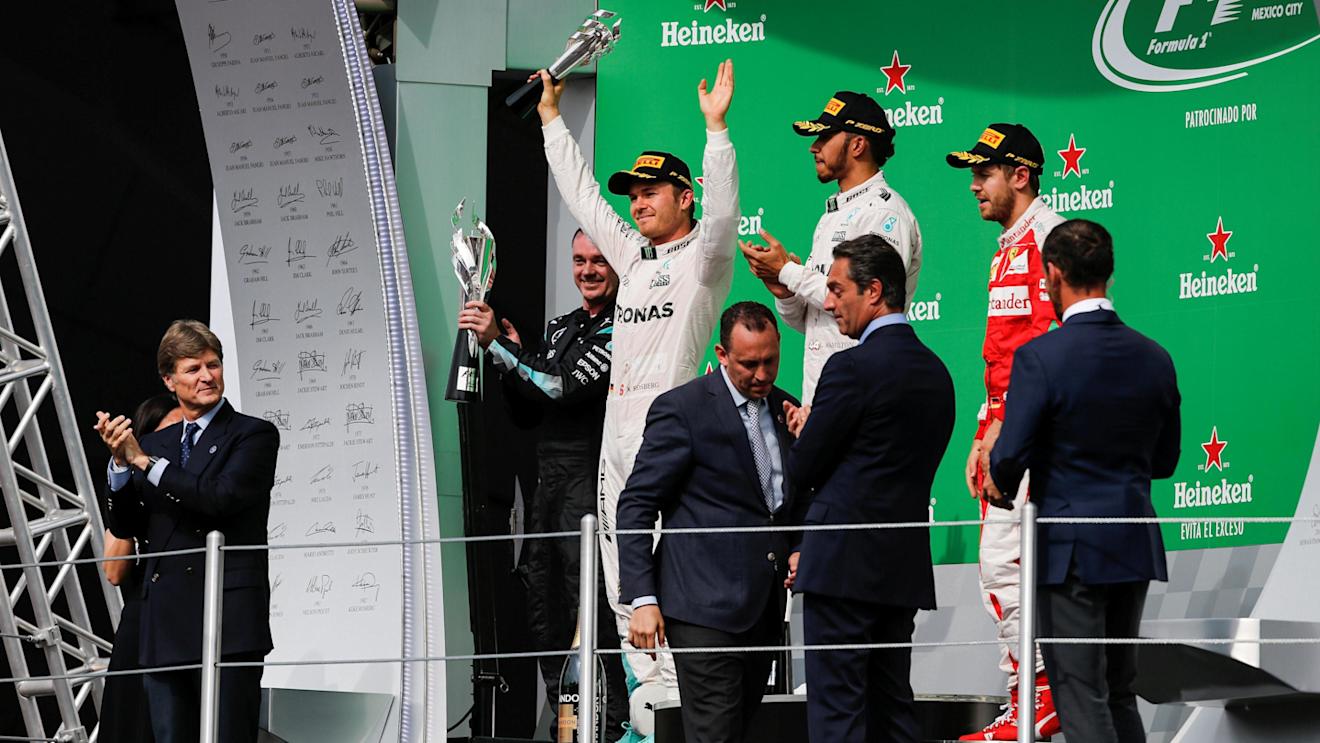 Tom Walton (GBR) Mercedes AMG F1 Engineer, Nico Rosberg (GER) Mercedes AMG F1, Lewis Hamilton (GBR) Mercedes AMG F1 and Sebastian Vettel (GER) Ferrari celebrate on the podium with the trophies at Formula One World Championship, Rd19, Mexican Grand Prix, Race, Circuit Hermanos Rodriguez, Mexico City, Mexico, Sunday 30 October 2016. © Sutton Images