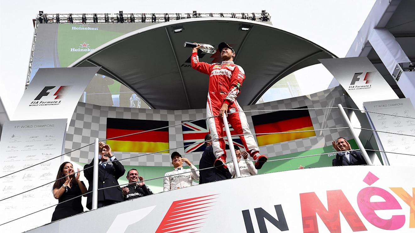 Sebastian Vettel (GER) Ferrari celebrates on the podium with the trophy at Formula One World Championship, Rd19, Mexican Grand Prix, Race, Circuit Hermanos Rodriguez, Mexico City, Mexico, Sunday 30 October 2016. © Sutton Images