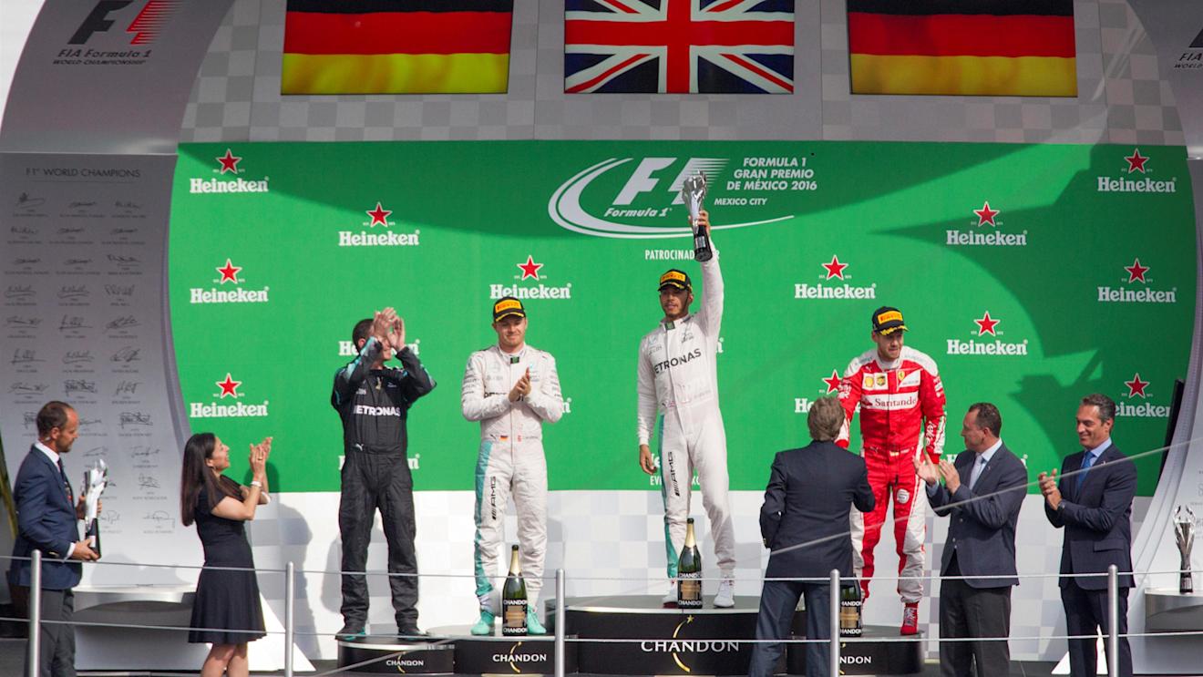 Nico Rosberg (GER) Mercedes AMG F1, Tom Walton (GBR) Mercedes AMG F1 Engineer, Lewis Hamilton (GBR) Mercedes AMG F1 and Sebastian Vettel (GER) Ferrari celebrate on the podium with the trophy at Formula One World Championship, Rd19, Mexican Grand Prix, Race, Circuit Hermanos Rodriguez, Mexico City, Mexico, Sunday 30 October 2016. © Sutton Images