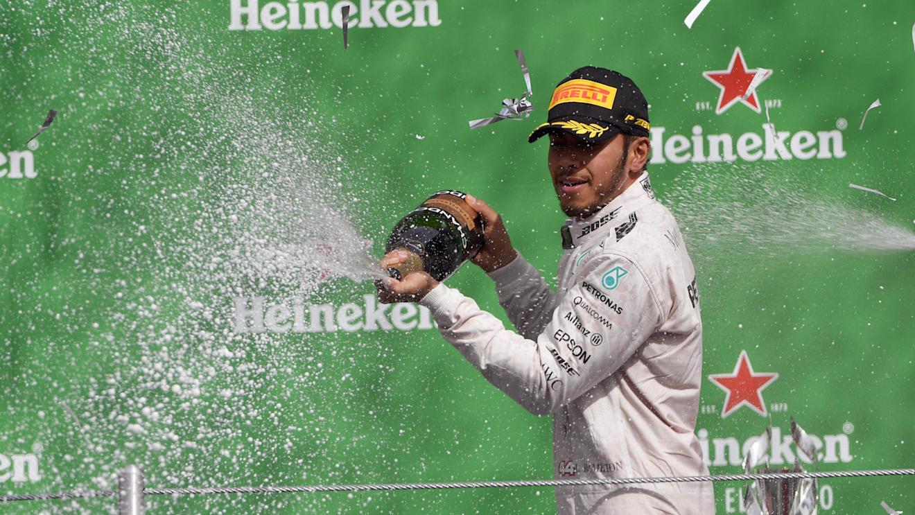 Race winner Lewis Hamilton (GBR) Mercedes AMG F1 celebrates on the podium with the champagne at Formula One World Championship, Rd19, Mexican Grand Prix, Race, Circuit Hermanos Rodriguez, Mexico City, Mexico, Sunday 30 October 2016. © Sutton Images