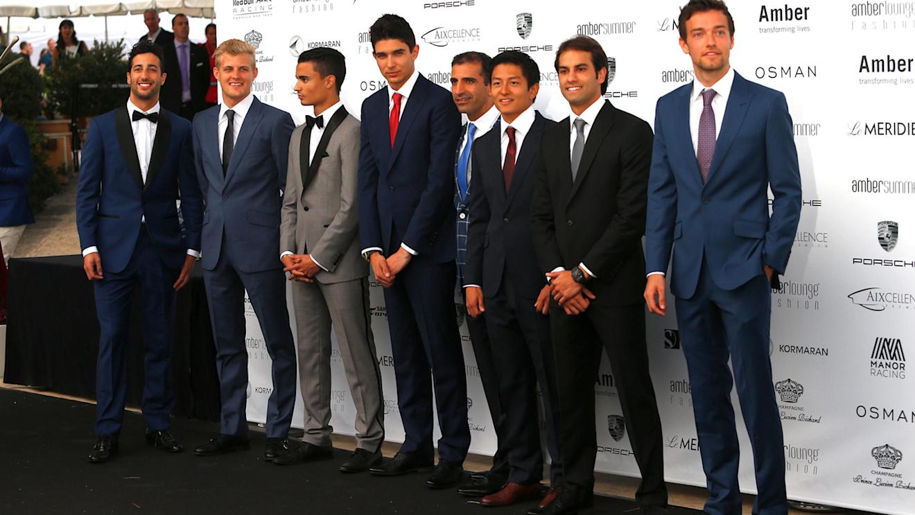 (L to R): Daniel Ricciardo (AUS) Red Bull Racing, Marcus Ericsson (SWE) Sauber, Pascal Wehrlein (GER) Manor Racing, Esteban Ocon (FRA) Renault Sport F1 Team, Marc Gene (ESP) Ferrari, Rio Haryanto (IDN) Manor Racing, Felipe Nasr (BRA) Sauber and Jolyon Palmer (GBR) Renault Sport F1 Team at Amber Lounge Fashion Show, Le Meridien Beach Plaza Hotel, Monaco, Friday 27 May 2016. © Sutton Images