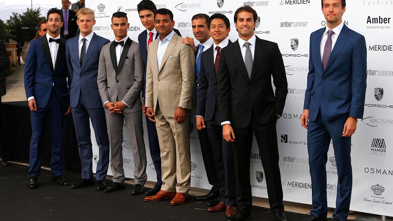 (L to R): Daniel Ricciardo (AUS) Red Bull Racing, Marcus Ericsson (SWE) Sauber, Pascal Wehrlein (GER) Manor Racing, Esteban Ocon (FRA) Renault Sport F1 Team, Marc Gene (ESP) Ferrari, Rio Haryanto (IDN) Manor Racing, Felipe Nasr (BRA) Sauber and Jolyon Palmer (GBR) Renault Sport F1 Team at Amber Lounge Fashion Show, Le Meridien Beach Plaza Hotel, Monaco, Friday 27 May 2016. © Sutton Images