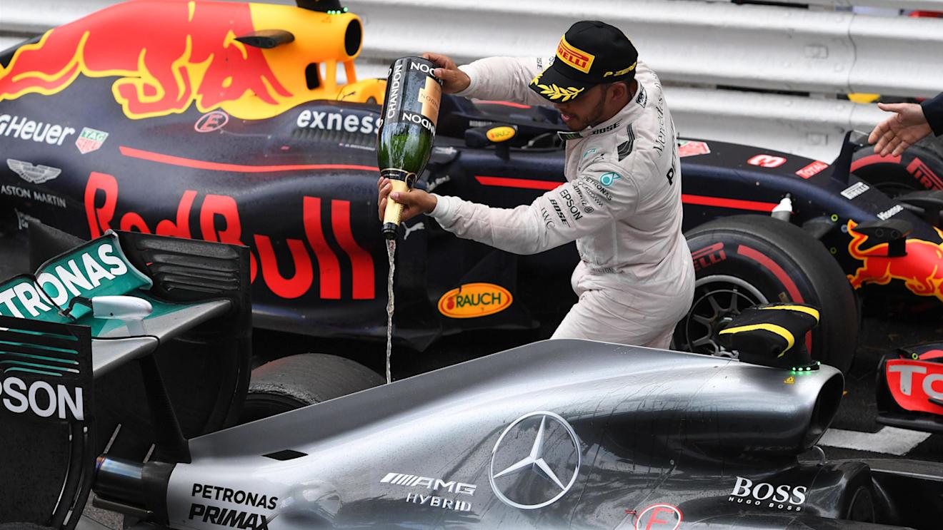 Race winner Lewis Hamilton (GBR) Mercedes AMG F1 celebrates at the podium with the champagne at Formula One World Championship, Rd6, Monaco Grand Prix, Race, Monte-Carlo, Monaco, Sunday 29 May 2016. © Sutton Images