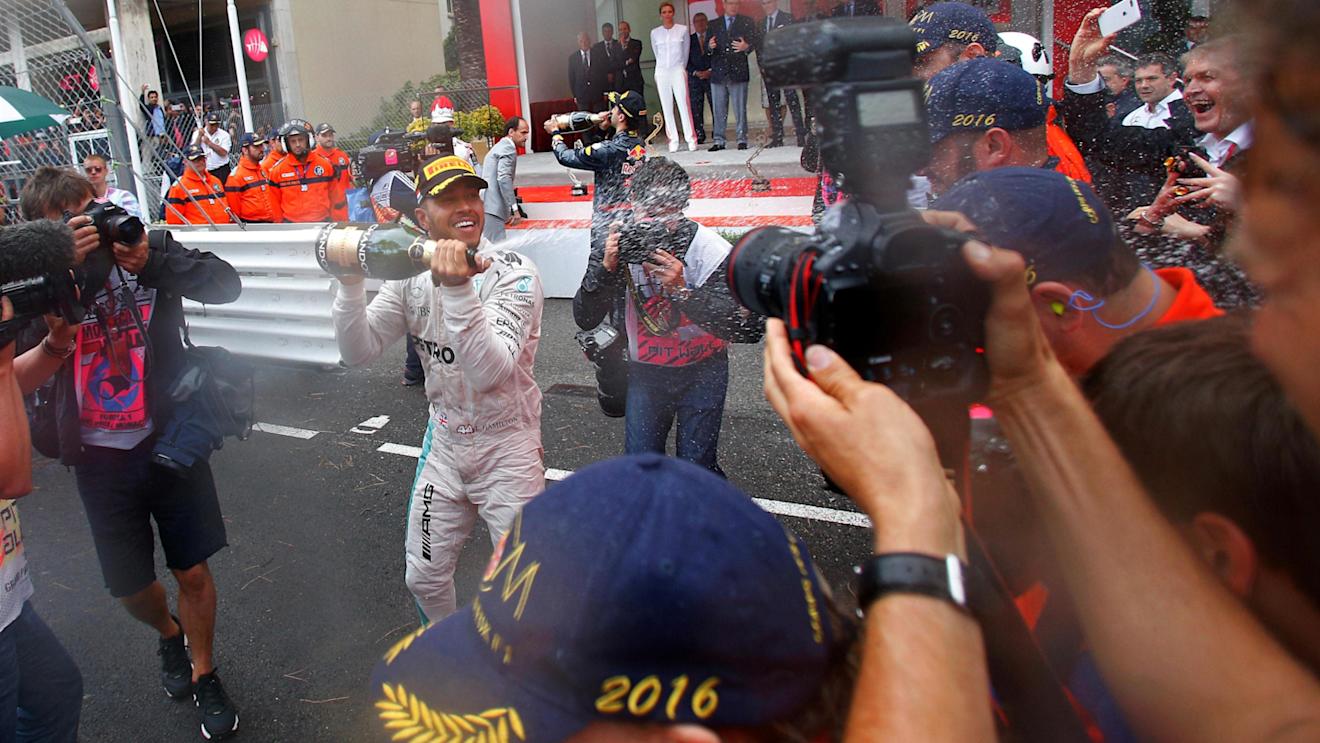 Race winner Lewis Hamilton (GBR) Mercedes AMG F1 celebrates at the podium with the champagne at Formula One World Championship, Rd6, Monaco Grand Prix, Race, Monte-Carlo, Monaco, Sunday 29 May 2016. © Sutton Images