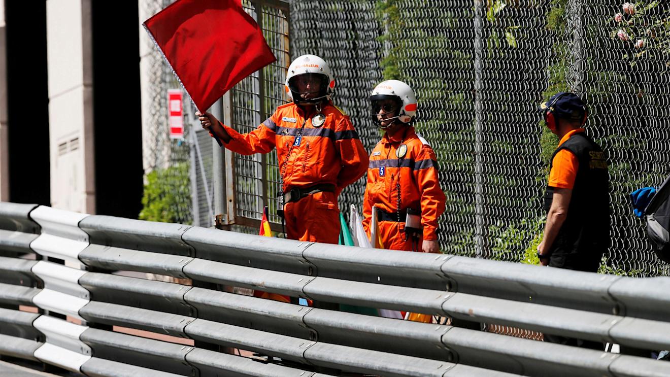 Marshals wave red flag in FP1 at Formula One World Championship, Rd6, Monaco Grand Prix, Practice, Monte-Carlo, Monaco, Thursday 26 May 2016. © Sutton Images