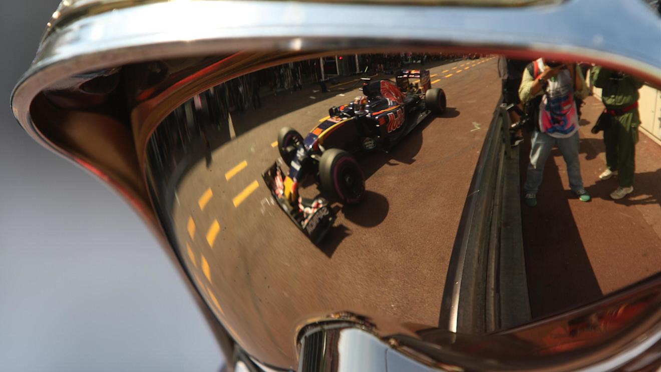 Carlos Sainz jr (ESP) Scuderia Toro Rosso STR11 reflected in firemans helmet at Formula One World Championship, Rd6, Monaco Grand Prix, Practice, Monte-Carlo, Monaco, Thursday 26 May 2016. © Sutton Images