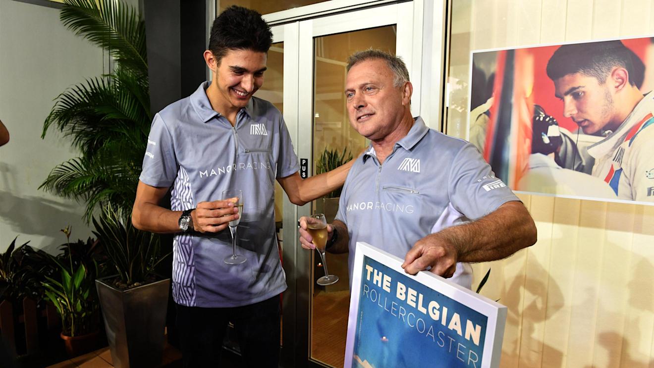 Esteban Ocon (FRA) Manor Racing celebrates his Birthday with Pat Fry (GBR) Manor Racing Racing Director at Formula One World Championship, Rd15, Singapore Grand Prix, Practice, Marina Bay Street Circuit, Singapore, Friday 16 September 2016. © Sutton Images