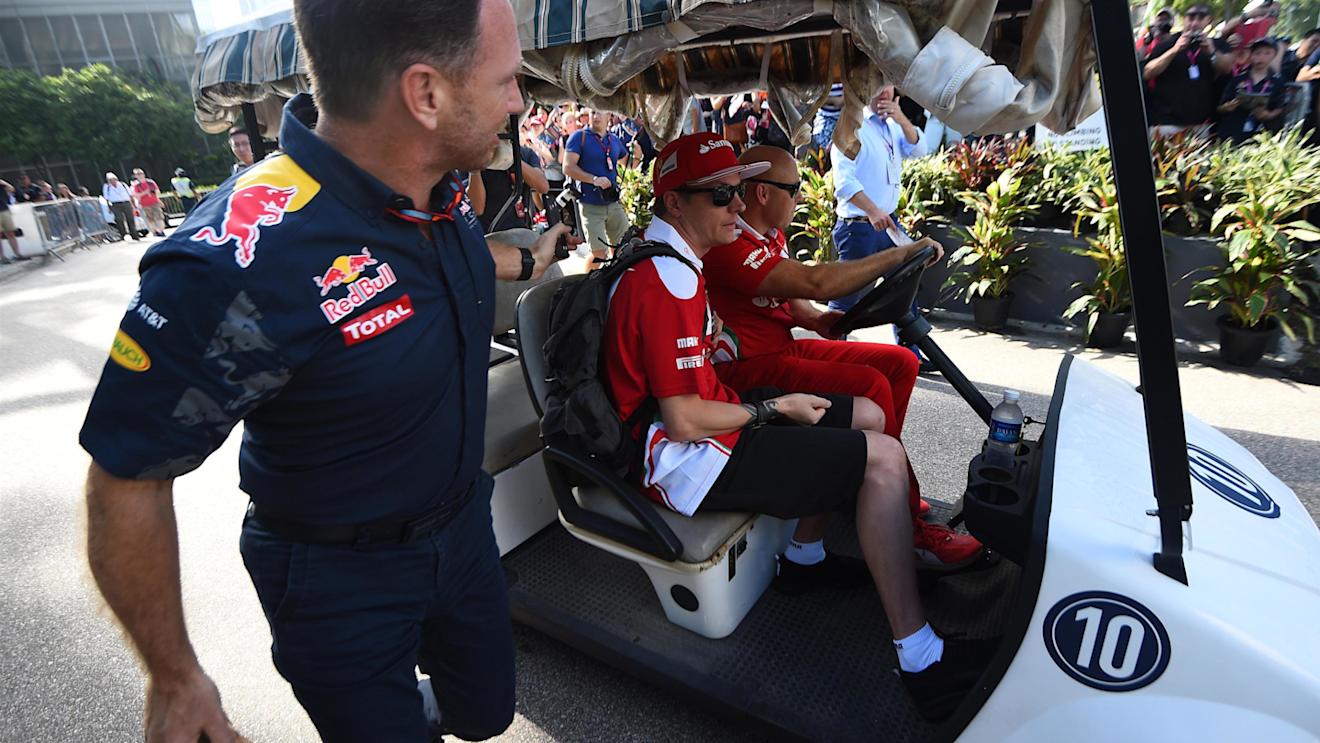 Christian Horner (GBR) Red Bull Racing Team Principal with Kimi Raikkonen (FIN) Ferrari at Formula One World Championship, Rd15, Singapore Grand Prix, Practice, Marina Bay Street Circuit, Singapore, Friday 16 September 2016. © Sutton Images