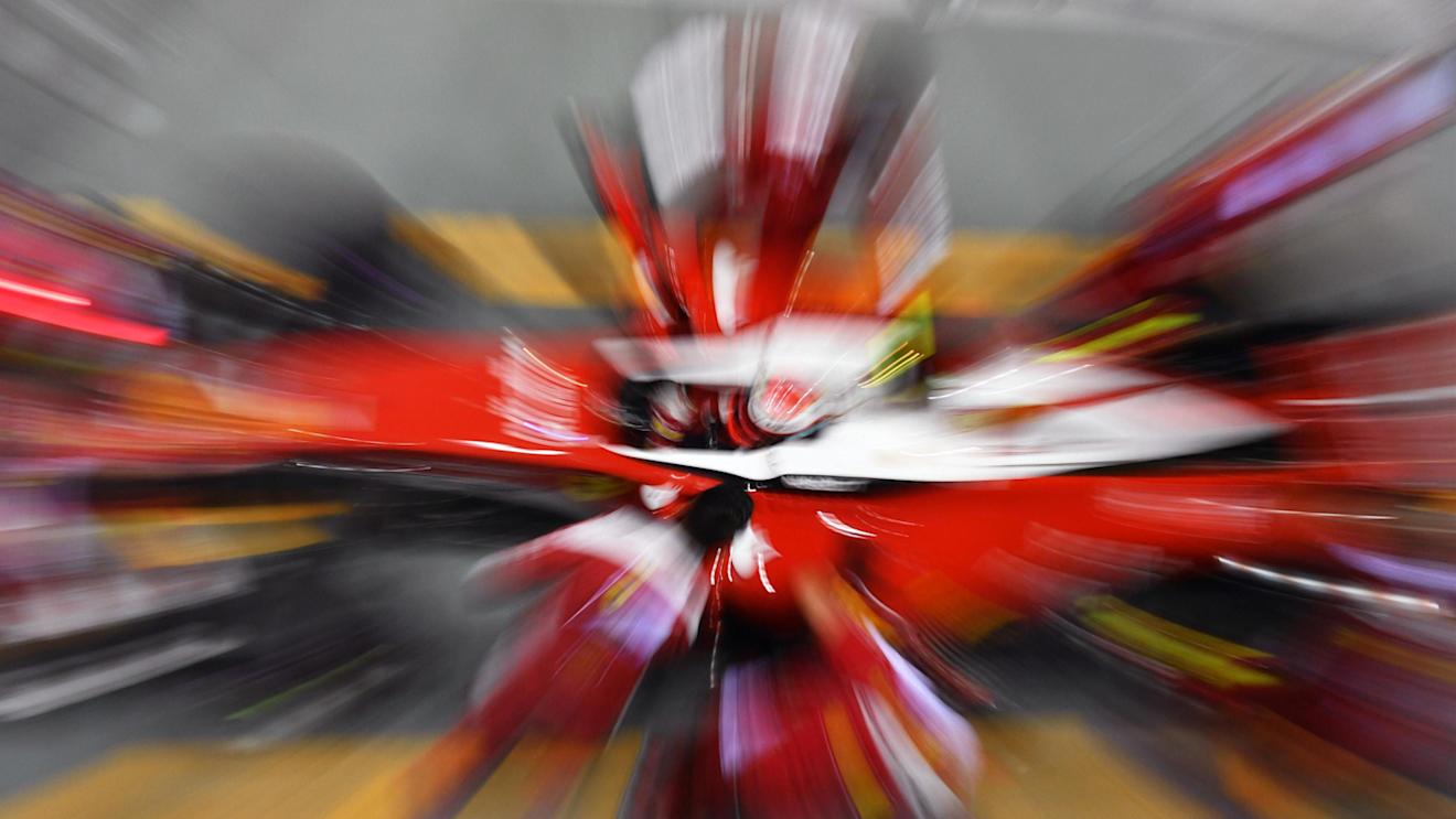 Kimi Raikkonen (FIN) Ferrari SF16-H pit stop at Formula One World Championship, Rd15, Singapore Grand Prix, Qualifying, Marina Bay Street Circuit, Singapore, Saturday 17 September 2016. © Sutton Images