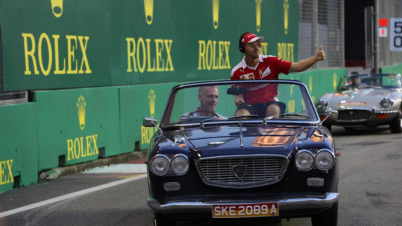 Sebastian Vettel (GER) Ferrari on the drivers parade at Formula One World Championship, Rd15, Singapore Grand Prix, Race, Marina Bay Street Circuit, Singapore, Sunday 18 September 2016. © Sutton Images
