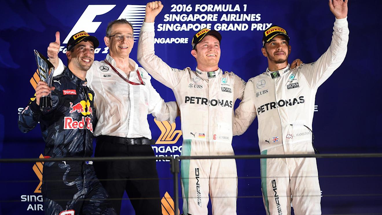 (L to R): Daniel Ricciardo (AUS) Red Bull Racing, Mark Ellis (GBR) Mercedes AMG F1 Performance Director, Race winner Nico Rosberg (GER) Mercedes AMG F1 and Lewis Hamilton (GBR) Mercedes AMG F1 celebrate on the podium at Formula One World Championship, Rd15, Singapore Grand Prix, Race, Marina Bay Street Circuit, Singapore, Sunday 18 September 2016. © Sutton Images