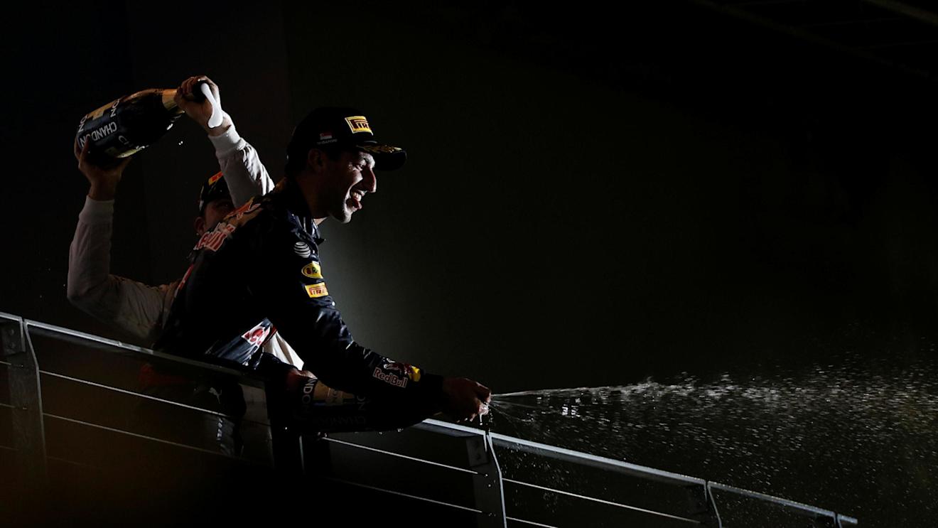 Race winner Nico Rosberg (GER) Mercedes AMG F1 and Daniel Ricciardo (AUS) Red Bull Racing celebrate on the podium with the champagne at Formula One World Championship, Rd15, Singapore Grand Prix, Race, Marina Bay Street Circuit, Singapore, Sunday 18 September 2016. © Sutton Images