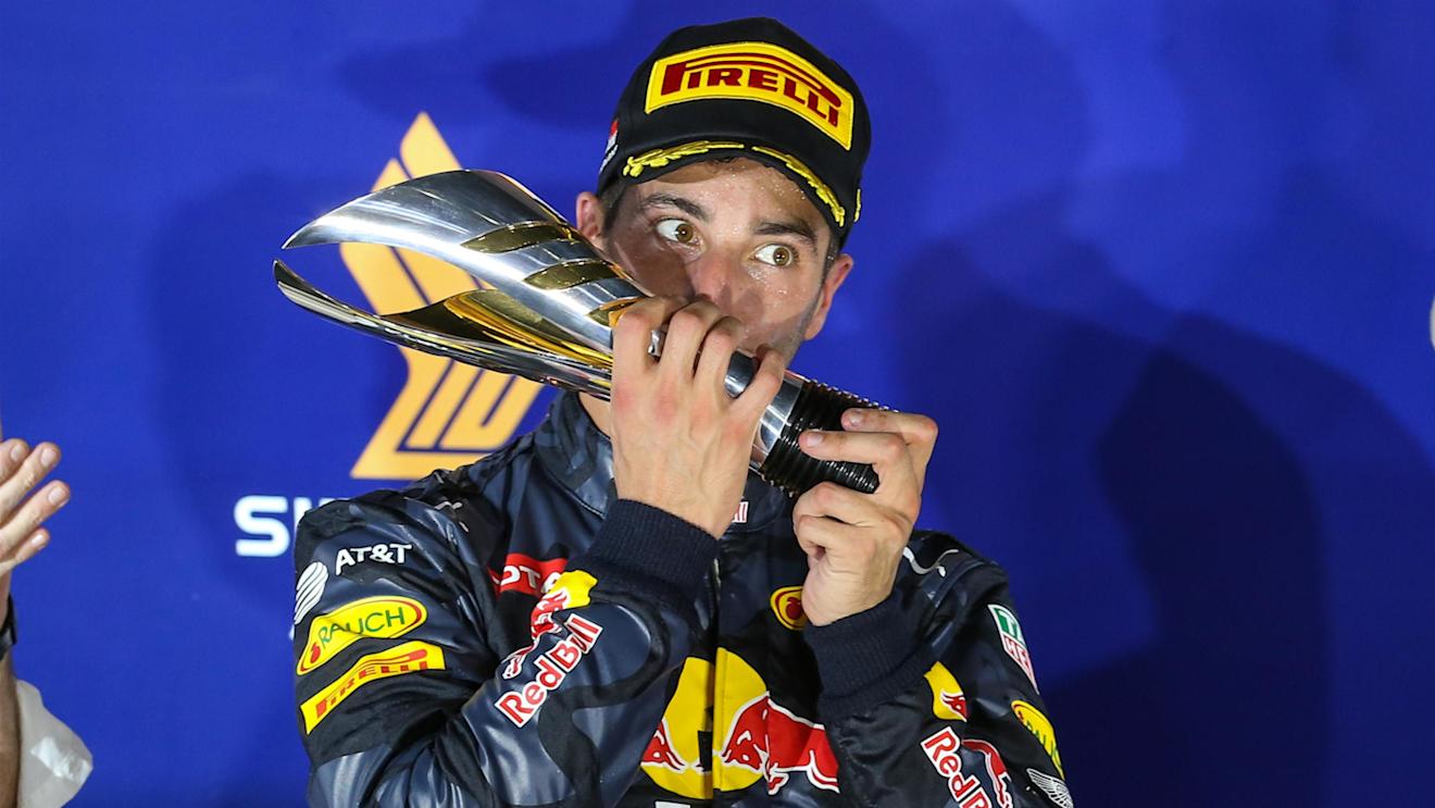 Daniel Ricciardo (AUS) Red Bull Racing celebrates on the podium with the trophy at Formula One World Championship, Rd15, Singapore Grand Prix, Race, Marina Bay Street Circuit, Singapore, Sunday 18 September 2016. © Sutton Images