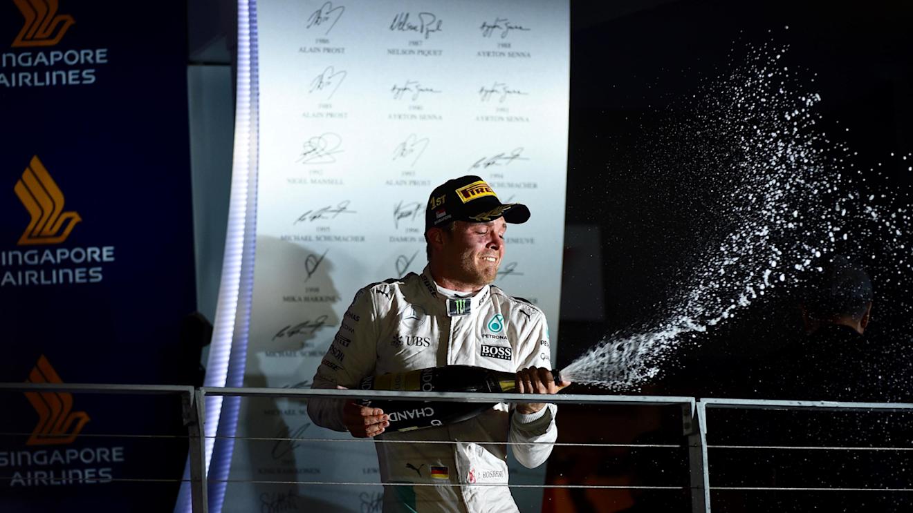Race winner Nico Rosberg (GER) Mercedes AMG F1 celebrates on the podium with the champagne at Formula One World Championship, Rd15, Singapore Grand Prix, Race, Marina Bay Street Circuit, Singapore, Sunday 18 September 2016. © Sutton Images