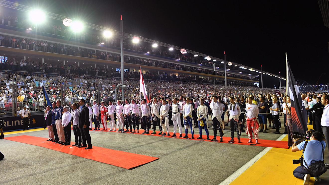 National Anthem is observed on the grid at Formula One World Championship, Rd15, Singapore Grand Prix, Race, Marina Bay Street Circuit, Singapore, Sunday 18 September 2016. © Sutton Images