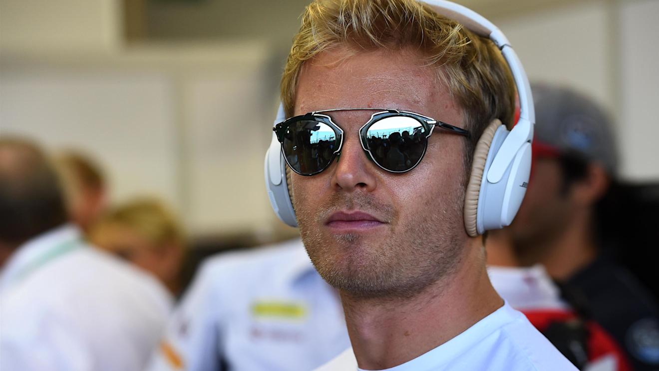 Nico Rosberg (GER) Mercedes AMG F1 with headphones on the drivers parade at Formula One World Championship, Rd15, Singapore Grand Prix, Race, Marina Bay Street Circuit, Singapore, Sunday 18 September 2016. © Sutton Images