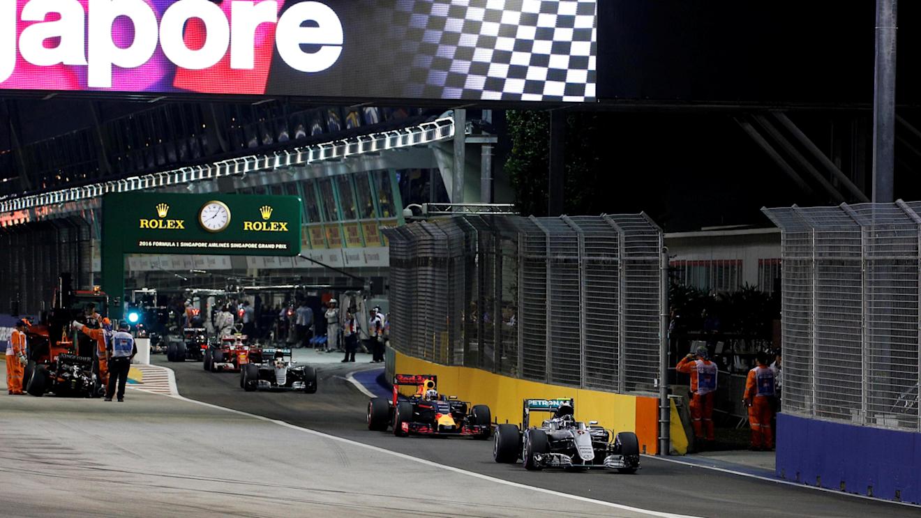 Nico Rosberg (GER) Mercedes-Benz F1 W07 Hybrid leads the cars through pit lane at Formula One World Championship, Rd15, Singapore Grand Prix, Race, Marina Bay Street Circuit, Singapore, Sunday 18 September 2016. © Sutton Images