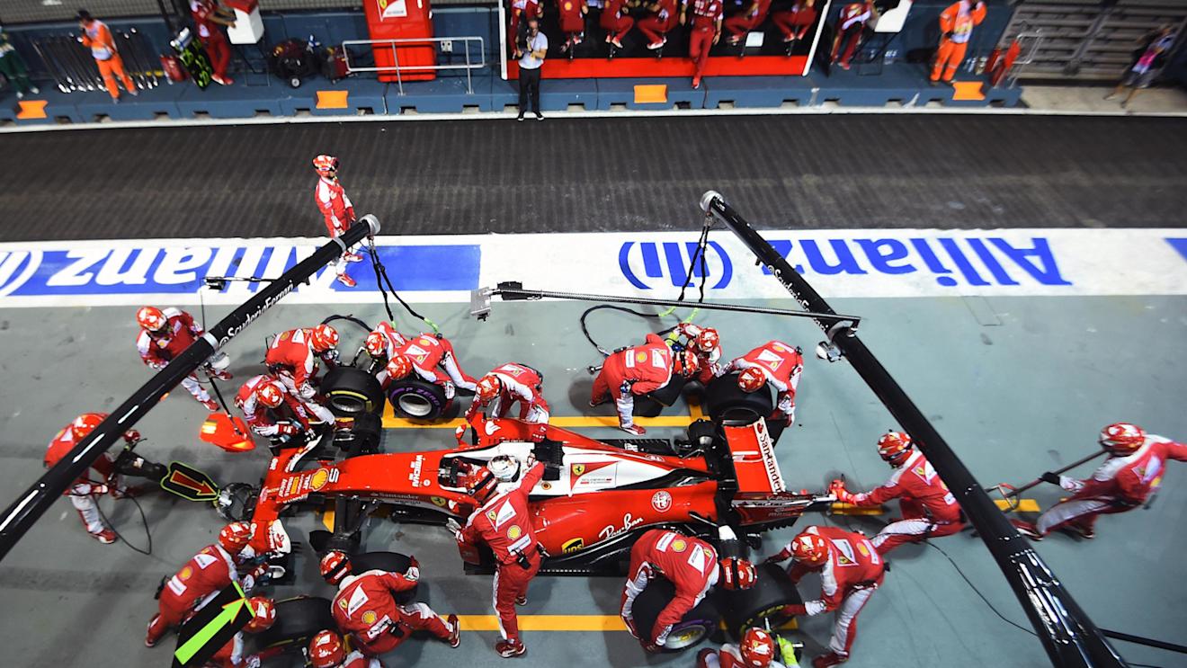 Sebastian Vettel (GER) Ferrari SF16-H pit stop at Formula One World Championship, Rd15, Singapore Grand Prix, Race, Marina Bay Street Circuit, Singapore, Sunday 18 September 2016. © Sutton Images