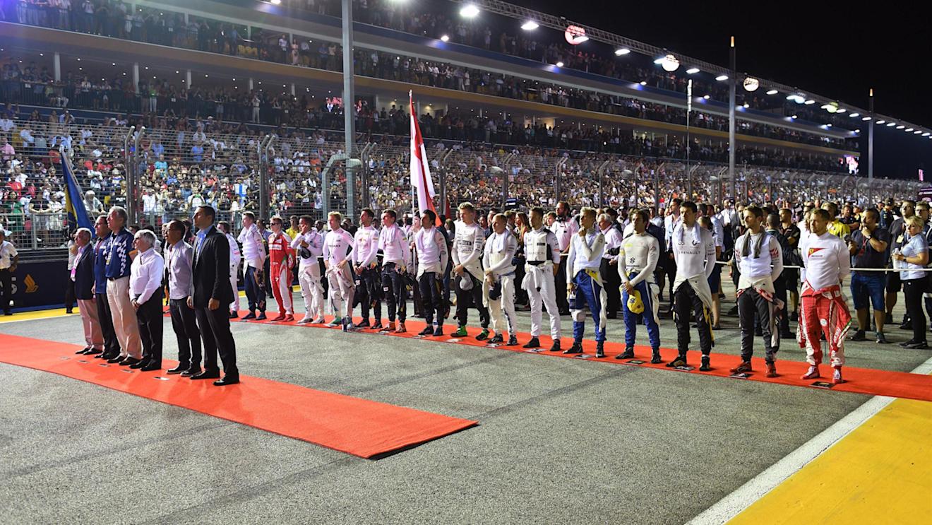 National Anthem is observed on the grid at Formula One World Championship, Rd15, Singapore Grand Prix, Race, Marina Bay Street Circuit, Singapore, Sunday 18 September 2016. © Sutton Images