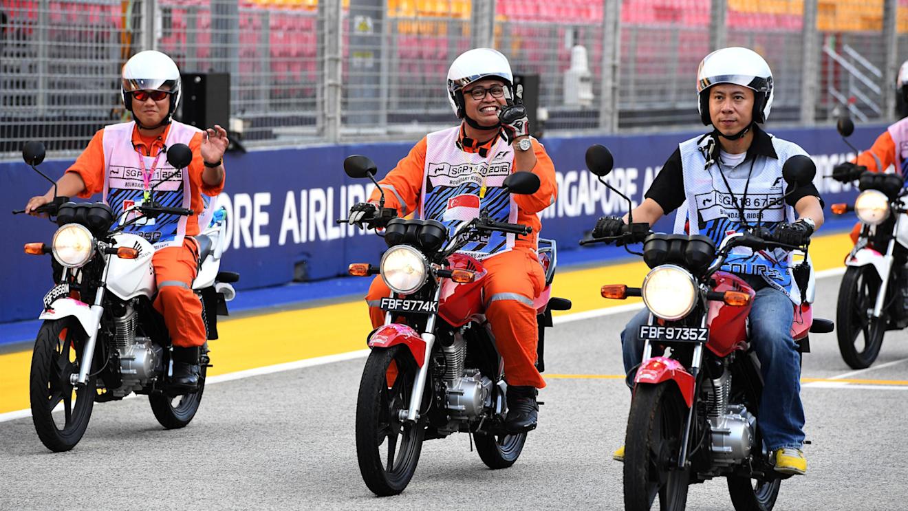Marshals on motorbikes at Formula One World Championship, Rd15, Singapore Grand Prix, Preparations, Marina Bay Street Circuit, Singapore, Thursday 15 September 2016. © Sutton Images