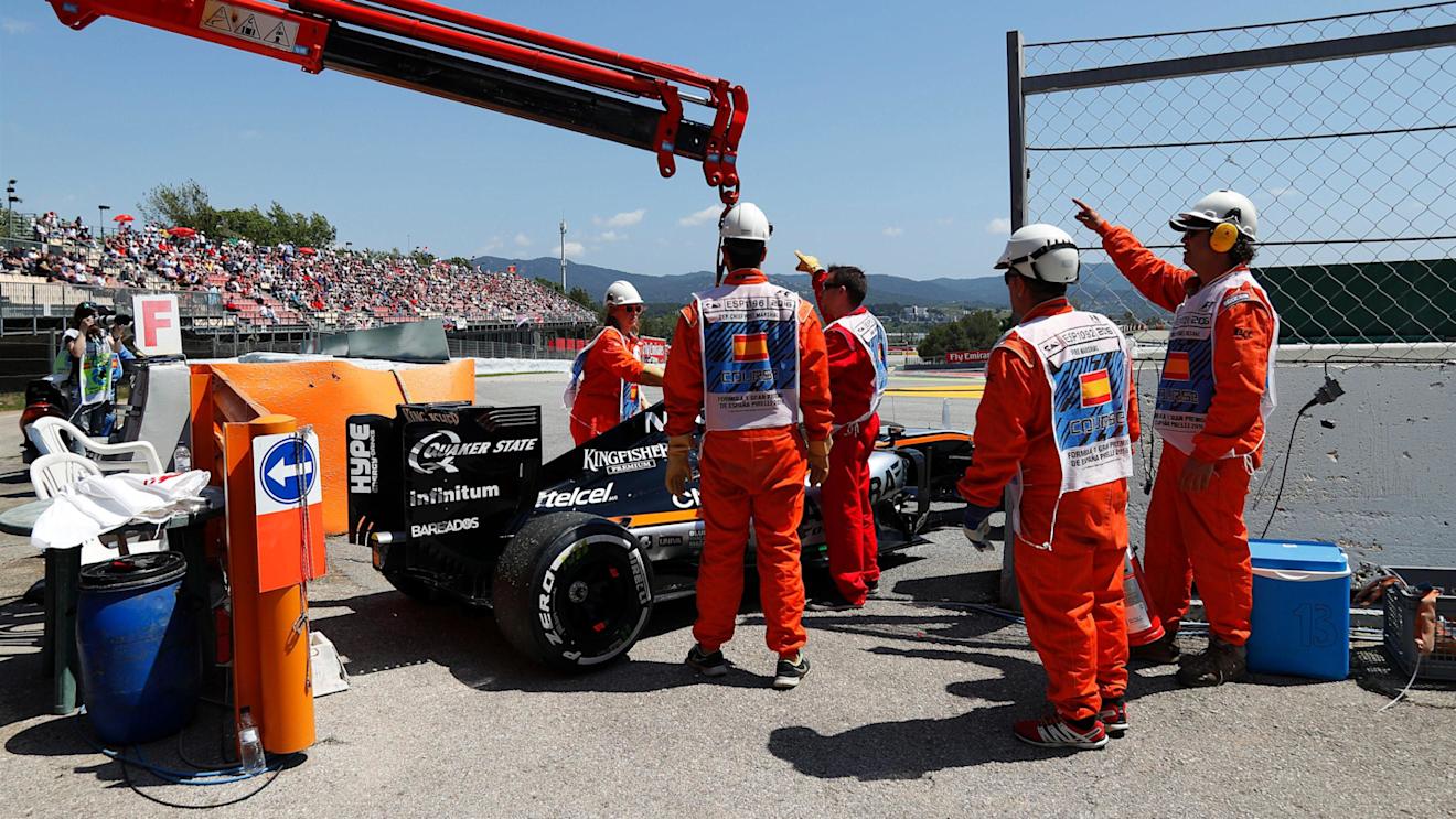 The car of Nico Hulkenberg (GER) Force India VJM09 is recovered after retiring from the race with a fire at Formula One World Championship, Rd5, Spanish Grand Prix, Race, Barcelona, Spain, Sunday 15 May 2016. © Sutton Images