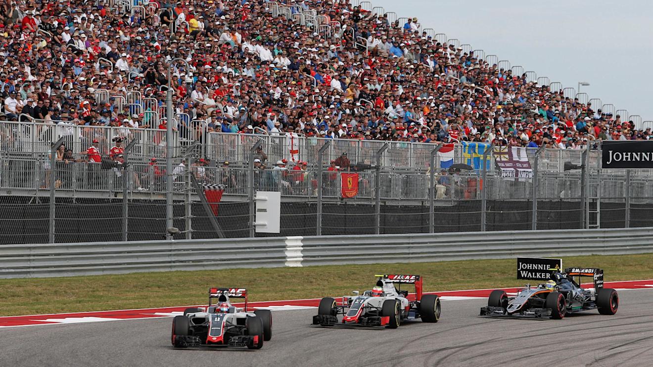 Romain Grosjean (FRA) Haas VF-16 and Esteban Gutierrez (MEX) Haas VF-16 battle with Sergio Perez (MEX) Force India VJM09 at Formula One World Championship, Rd18, United States Grand Prix, Race, Circuit of the Americas, Austin, Texas, USA, Sunday 23 October 2016. © Sutton Images