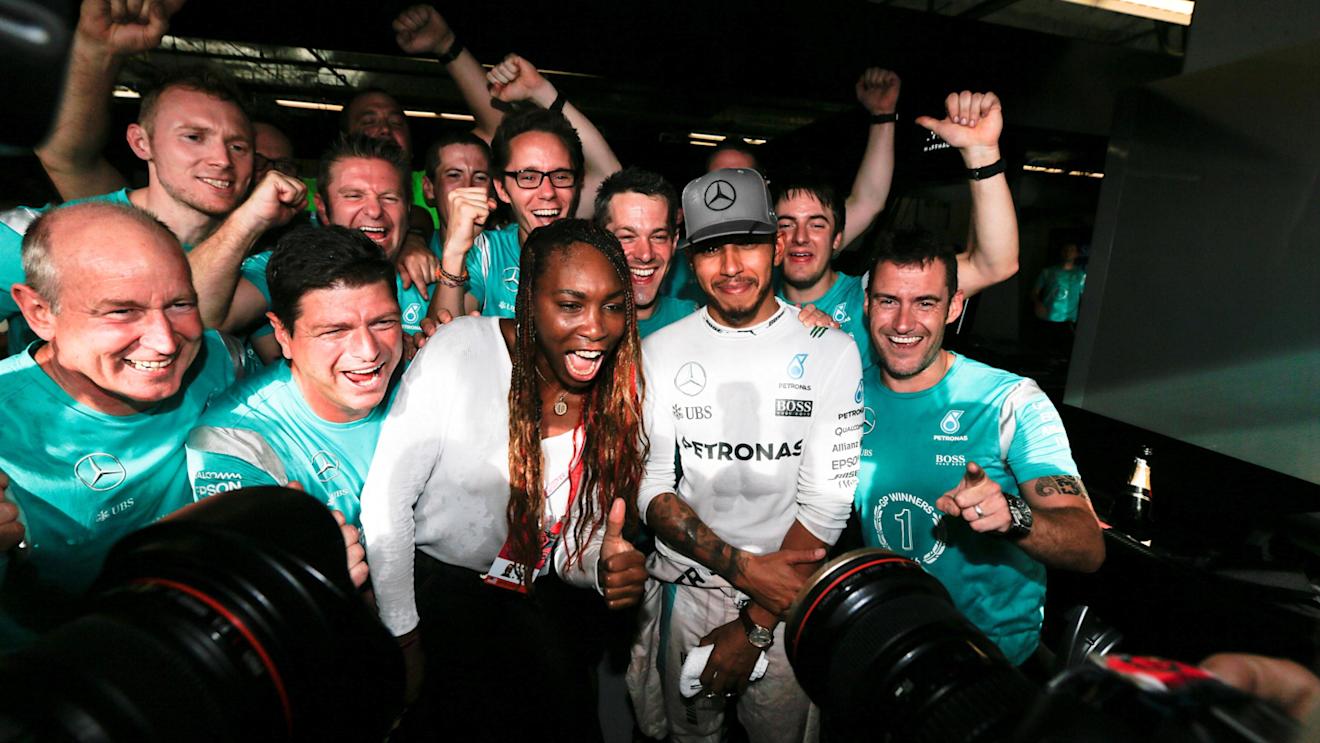 Race winner Lewis Hamilton (GBR) Mercedes AMG F1 celebrates with Venus Williams (USA) Tennis PLayer and the team at Formula One World Championship, Rd18, United States Grand Prix, Race, Circuit of the Americas, Austin, Texas, USA, Sunday 23 October 2016. © Sutton Images
