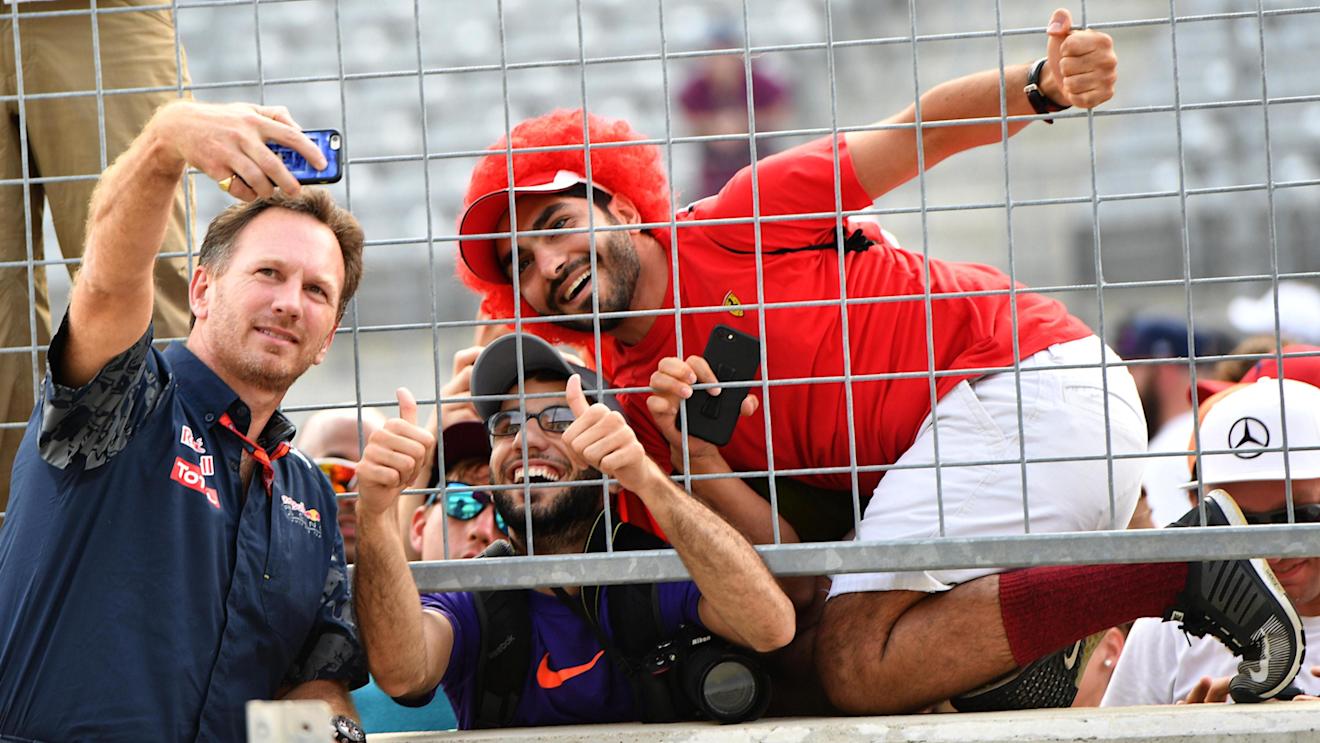 Christian Horner (GBR) Red Bull Racing Team Principal selfie with fans at Formula One World Championship, Rd18, United States Grand Prix, Race, Circuit of the Americas, Austin, Texas, USA, Sunday 23 October 2016. © Sutton Images