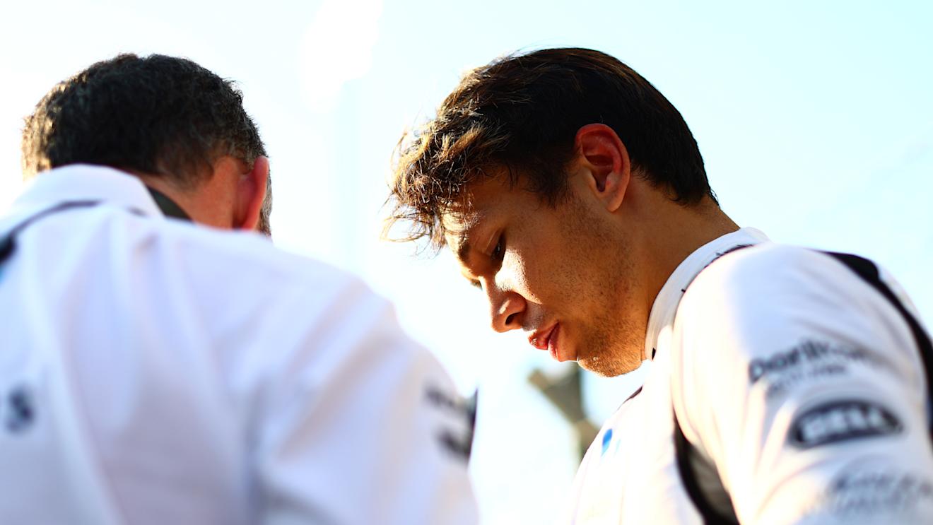 ABU DHABI, UNITED ARAB EMIRATES - NOVEMBER 26: Alexander Albon of Thailand and Williams prepares to drive on the grid prior to the F1 Grand Prix of Abu Dhabi at Yas Marina Circuit on November 26, 2023 in Abu Dhabi, United Arab Emirates. (Photo by Clive Rose/Getty Images)