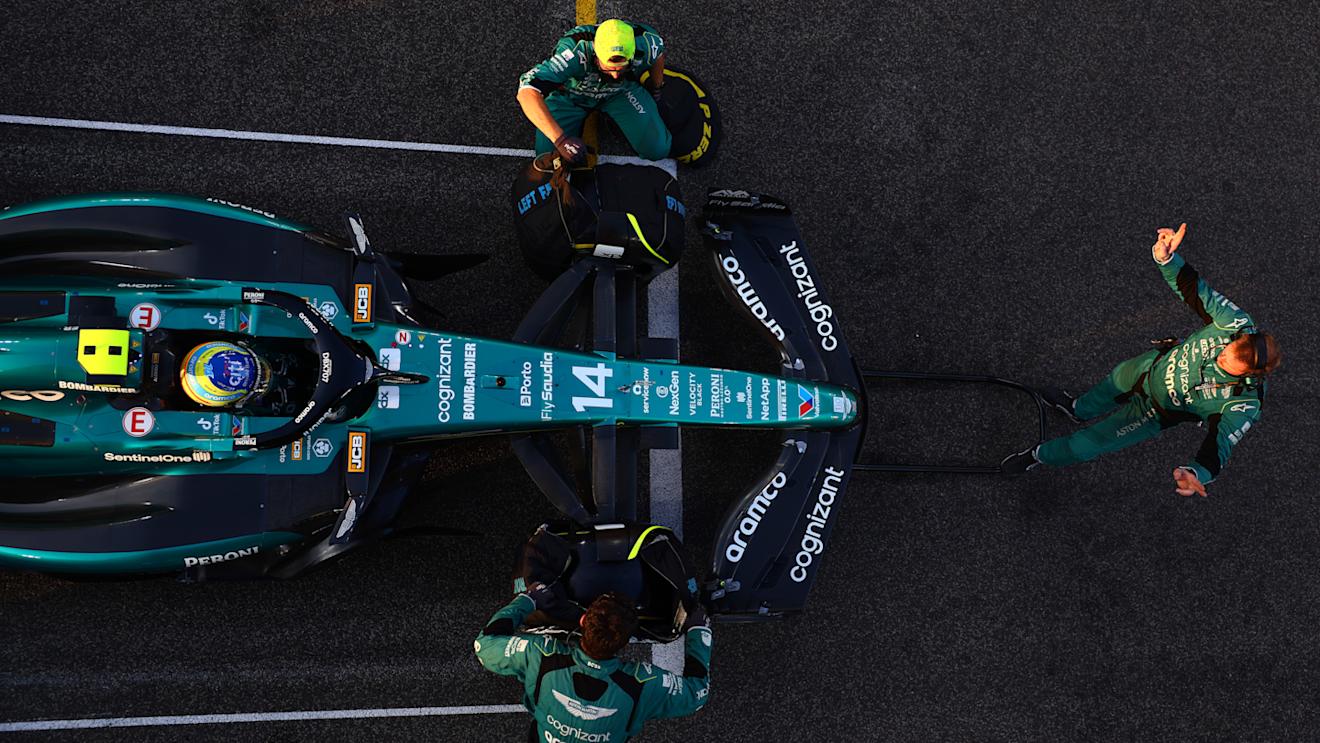 ABU DHABI, UNITED ARAB EMIRATES - NOVEMBER 26: Fernando Alonso of Spain driving the (14) Aston Martin AMR23 Mercedes prepares to drive on the grid during the F1 Grand Prix of Abu Dhabi at Yas Marina Circuit on November 26, 2023 in Abu Dhabi, United Arab Emirates. (Photo by Dan Istitene - Formula 1/Formula 1 via Getty Images)