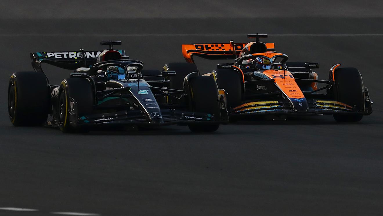 ABU DHABI, UNITED ARAB EMIRATES - NOVEMBER 26: George Russell of Great Britain driving the (63) Mercedes AMG Petronas F1 Team W14 leads Oscar Piastri of Australia driving the (81) McLaren MCL60 Mercedes during the F1 Grand Prix of Abu Dhabi at Yas Marina Circuit on November 26, 2023 in Abu Dhabi, United Arab Emirates. (Photo by Joe Portlock - Formula 1/Formula 1 via Getty Images)