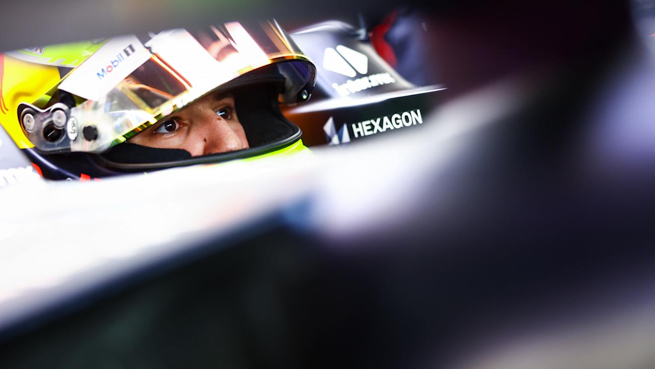 ABU DHABI, UNITED ARAB EMIRATES - NOVEMBER 24: Isack Hadjar of France and Red Bull Racing prepares to drive in the garage during practice ahead of the F1 Grand Prix of Abu Dhabi at Yas Marina Circuit on November 24, 2023 in Abu Dhabi, United Arab Emirates. (Photo by Mark Thompson/Getty Images)