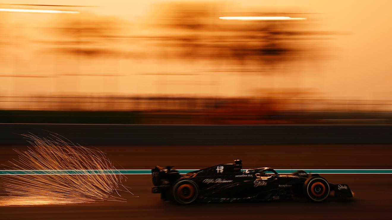 ABU DHABI, UNITED ARAB EMIRATES - NOVEMBER 24: Sparks fly behind Valtteri Bottas of Finland driving the (77) Alfa Romeo F1 C43 Ferrari during practice ahead of the F1 Grand Prix of Abu Dhabi at Yas Marina Circuit on November 24, 2023 in Abu Dhabi, United Arab Emirates. (Photo by Clive Mason - Formula 1/Formula 1 via Getty Images)