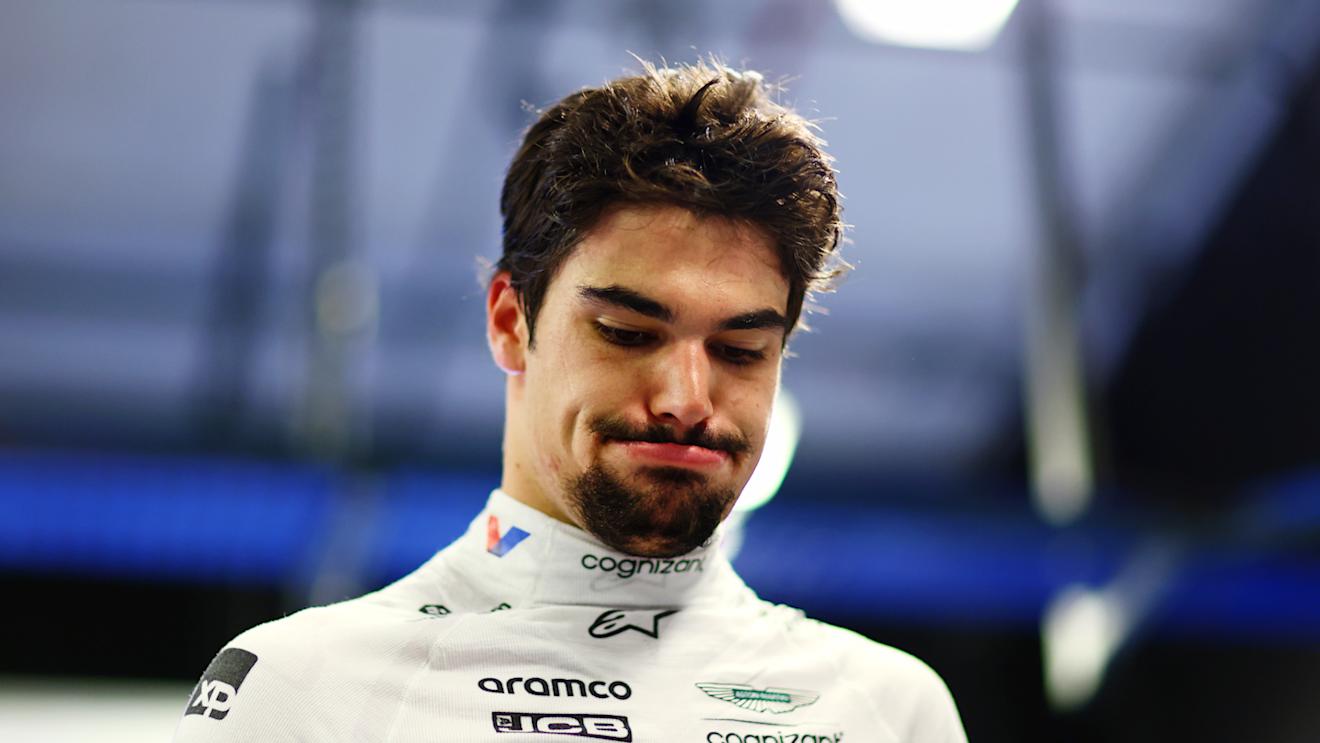 ABU DHABI, UNITED ARAB EMIRATES - NOVEMBER 25: 13th placed qualifier Lance Stroll of Canada and Aston Martin F1 Team looks on in the FIA garage during qualifying ahead of the F1 Grand Prix of Abu Dhabi at Yas Marina Circuit on November 25, 2023 in Abu Dhabi, United Arab Emirates. (Photo by Dan Istitene - Formula 1/Formula 1 via Getty Images)