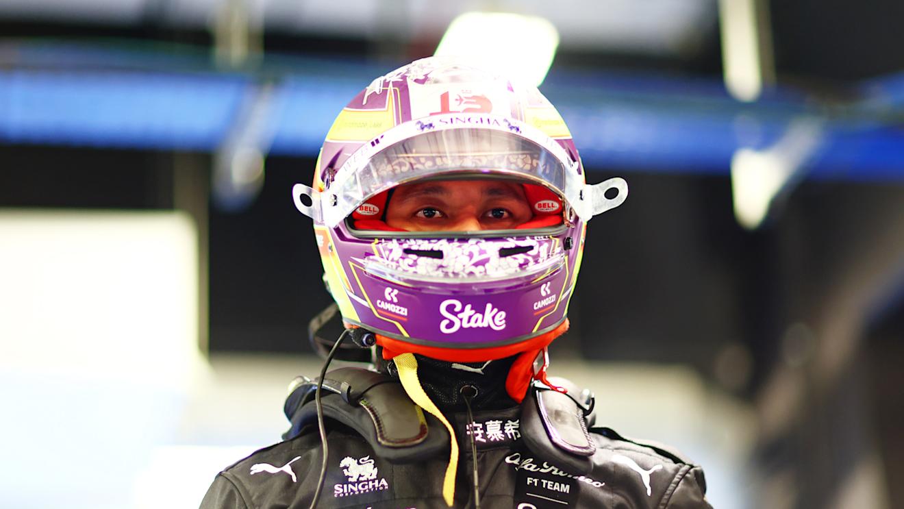 ABU DHABI, UNITED ARAB EMIRATES - NOVEMBER 25: 19th placed qualifier Zhou Guanyu of China and Alfa Romeo F1 looks on in the FIA garage during qualifying ahead of the F1 Grand Prix of Abu Dhabi at Yas Marina Circuit on November 25, 2023 in Abu Dhabi, United Arab Emirates. (Photo by Dan Istitene - Formula 1/Formula 1 via Getty Images)