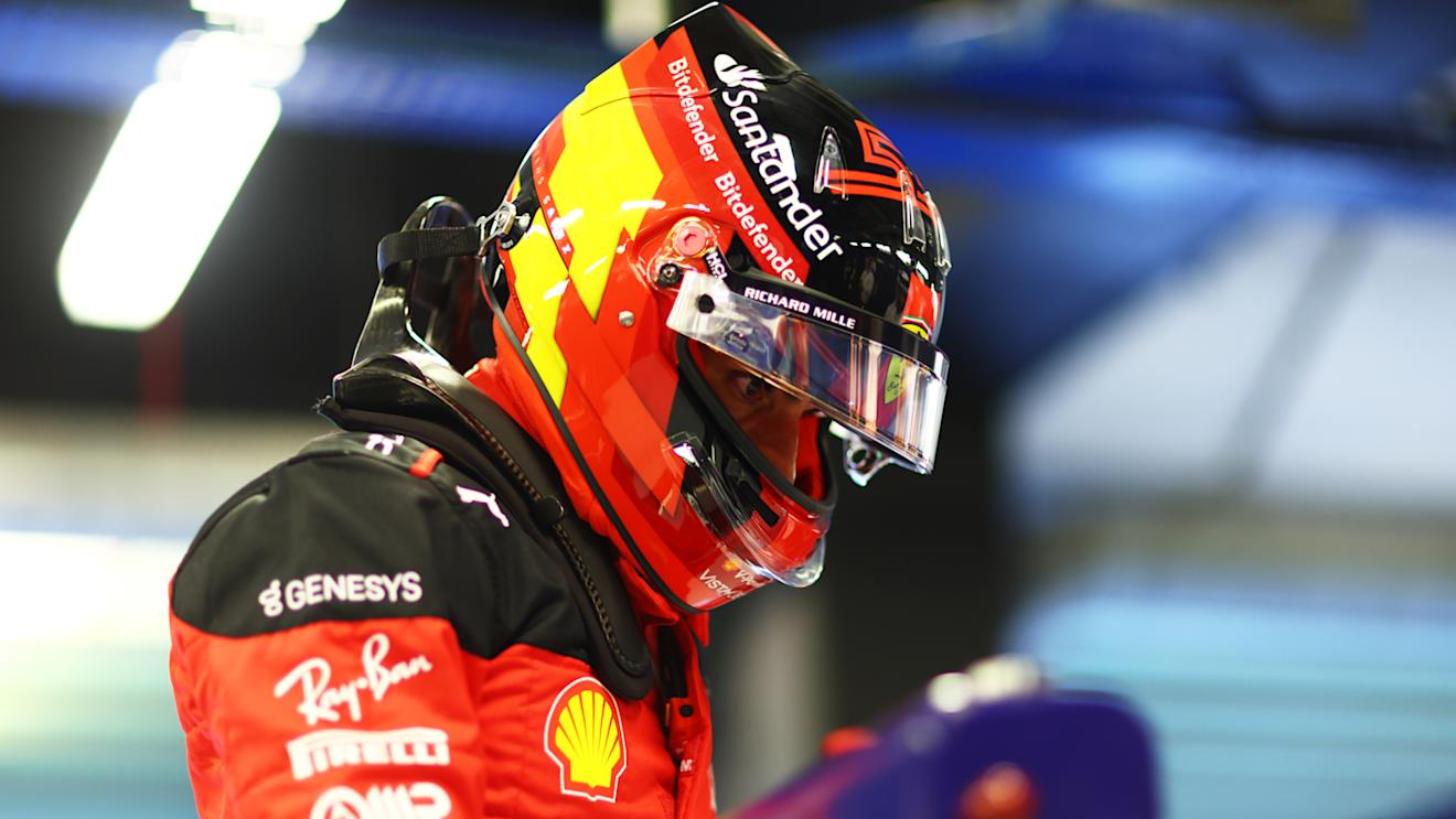 ABU DHABI, UNITED ARAB EMIRATES - NOVEMBER 25: 16th placed qualifier Carlos Sainz of Spain and Ferrari looks on in the FIA garage during qualifying ahead of the F1 Grand Prix of Abu Dhabi at Yas Marina Circuit on November 25, 2023 in Abu Dhabi, United Arab Emirates. (Photo by Dan Istitene - Formula 1/Formula 1 via Getty Images)