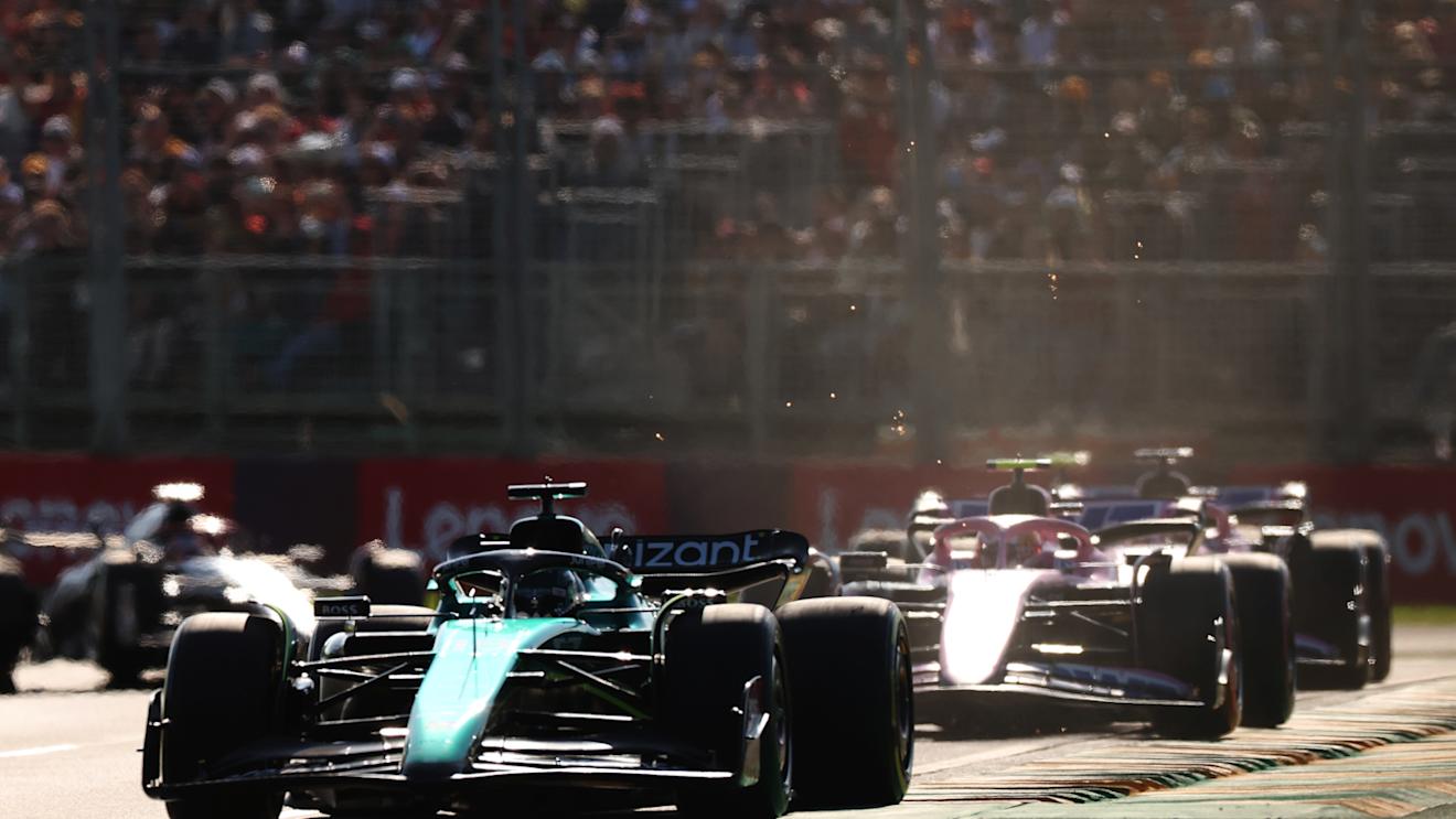 MELBOURNE, AUSTRALIA - APRIL 02: Lance Stroll of Canada driving the (18) Aston Martin AMR23 Mercedes leads Pierre Gasly of France driving the (10) Alpine F1 A523 Renault during the F1 Grand Prix of Australia at Albert Park Grand Prix Circuit on April 02, 2023 in Melbourne, Australia. (Photo by Robert Cianflone/Getty Images)