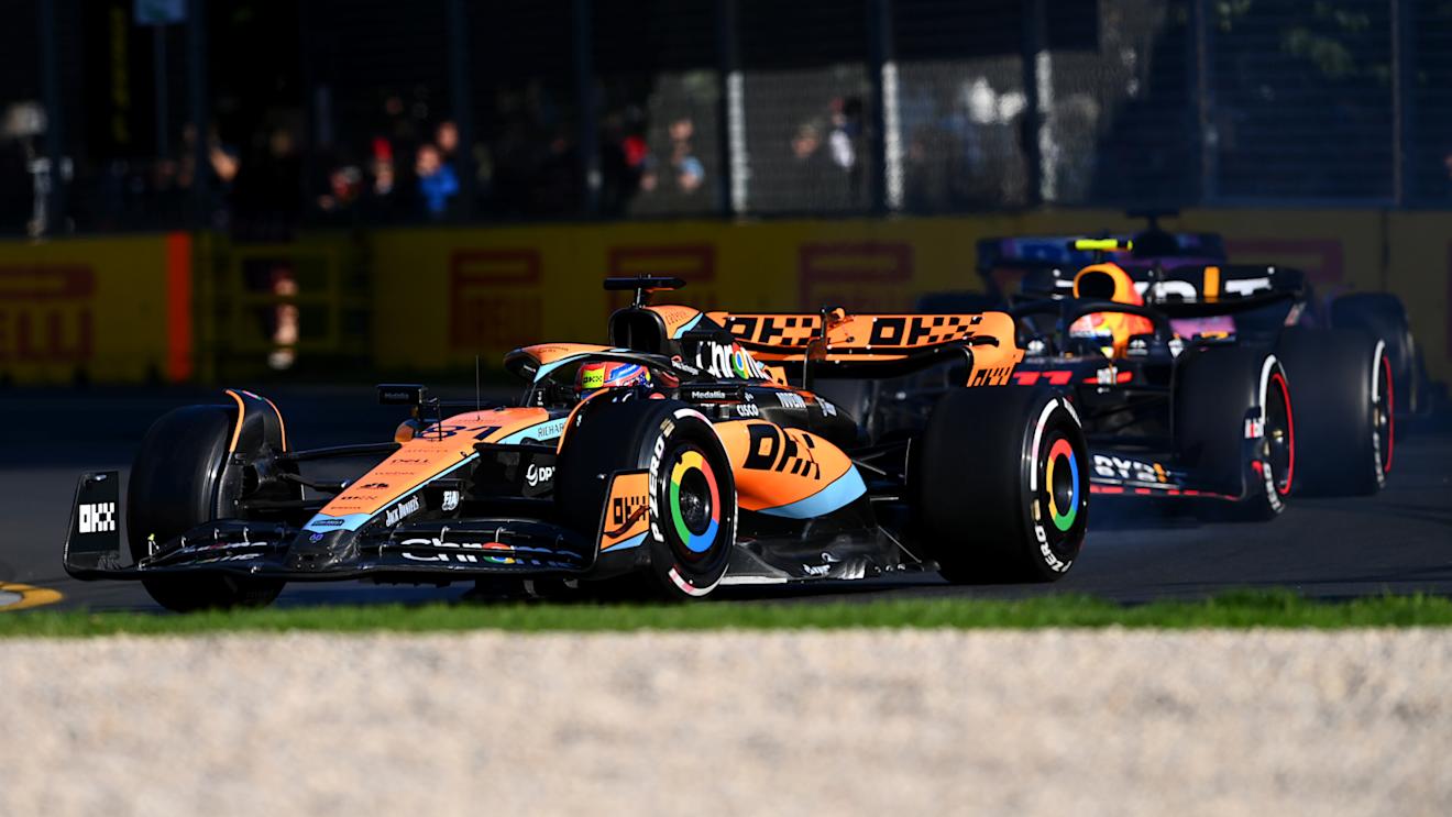MELBOURNE, AUSTRALIA - APRIL 02: Oscar Piastri of Australia driving the (81) McLaren MCL60 Mercedes leads Sergio Perez of Mexico driving the (11) Oracle Red Bull Racing RB19 during the F1 Grand Prix of Australia at Albert Park Grand Prix Circuit on April 02, 2023 in Melbourne, Australia. (Photo by Quinn Rooney/Getty Images)
