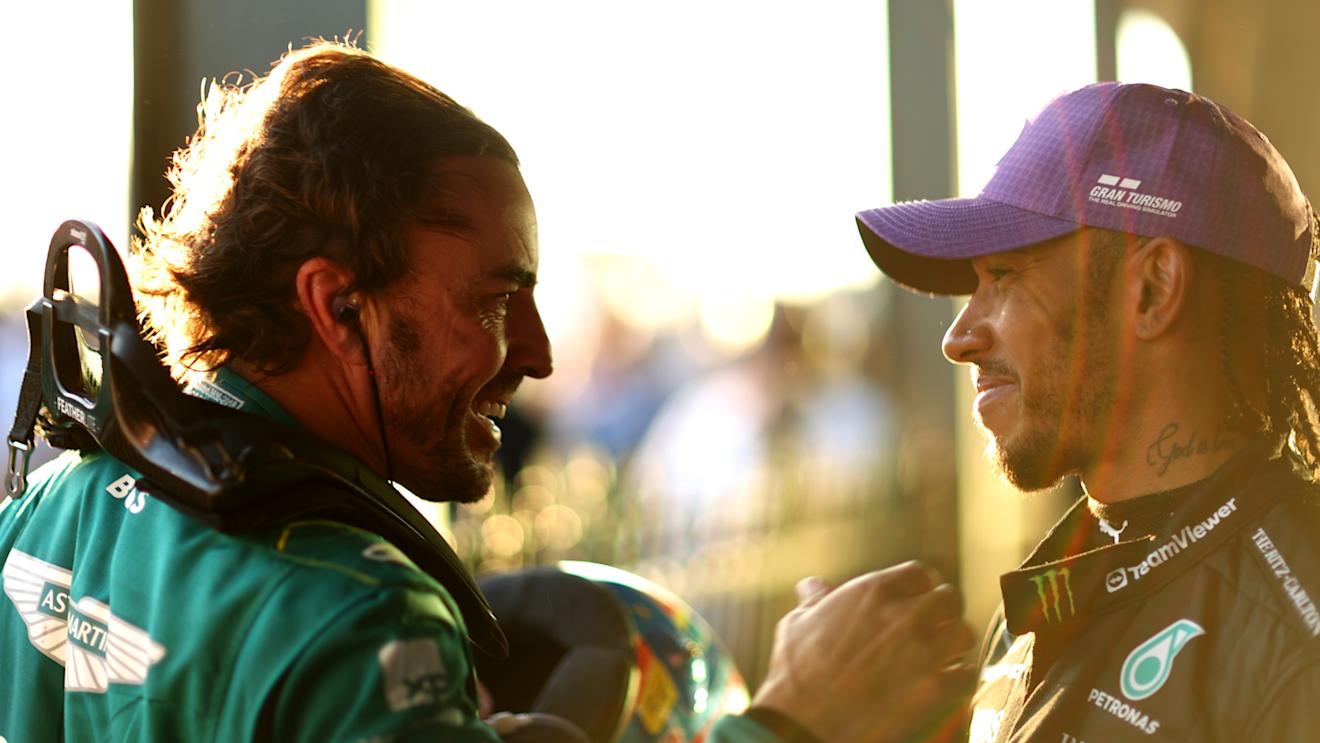 MELBOURNE, AUSTRALIA - APRIL 02: Second placed Lewis Hamilton of Great Britain and Mercedes and Third placed Fernando Alonso of Spain and Aston Martin F1 Team celebrate in parc ferme during the F1 Grand Prix of Australia at Albert Park Grand Prix Circuit on April 02, 2023 in Melbourne, Australia. (Photo by Dan Istitene - Formula 1/Formula 1 via Getty Images)