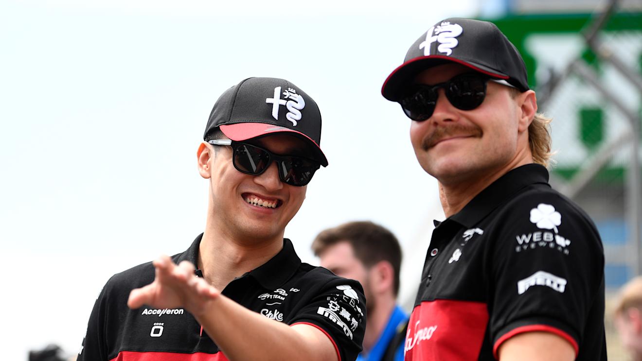 BAKU, AZERBAIJAN - APRIL 30: Zhou Guanyu of China and Alfa Romeo F1 talks with Valtteri Bottas of Finland and Alfa Romeo F1 in the Paddock prior to the F1 Grand Prix of Azerbaijan at Baku City Circuit on April 30, 2023 in Baku, Azerbaijan. (Photo by Rudy Carezzevoli/Getty Images)