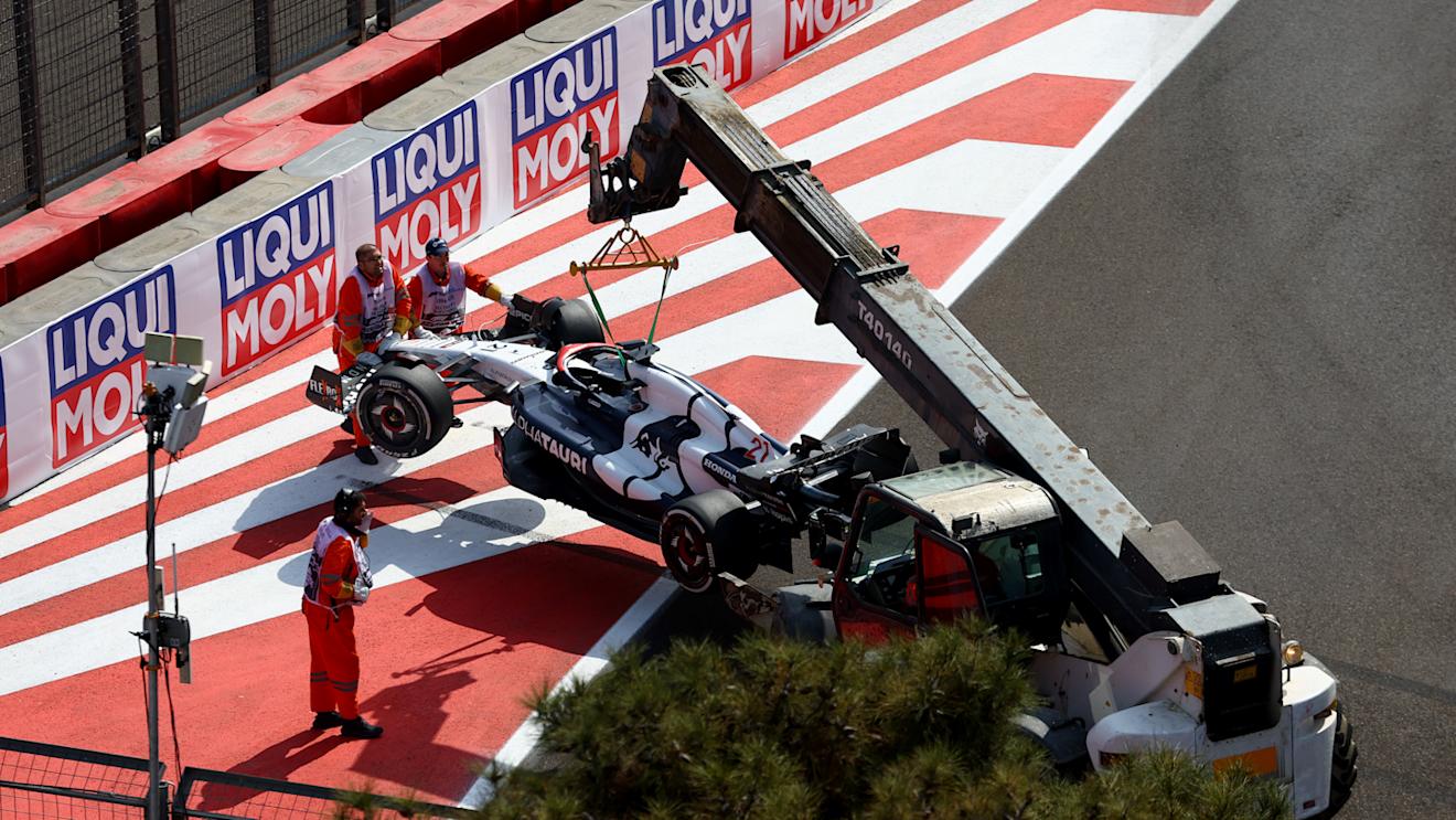BAKU, AZERBAIJAN - APRIL 30: The car of Nyck de Vries of Netherlands and Scuderia AlphaTauri is recovered from the track after he retired from the race during the F1 Grand Prix of Azerbaijan at Baku City Circuit on April 30, 2023 in Baku, Azerbaijan. (Photo by Bryn Lennon - Formula 1/Formula 1 via Getty Images)