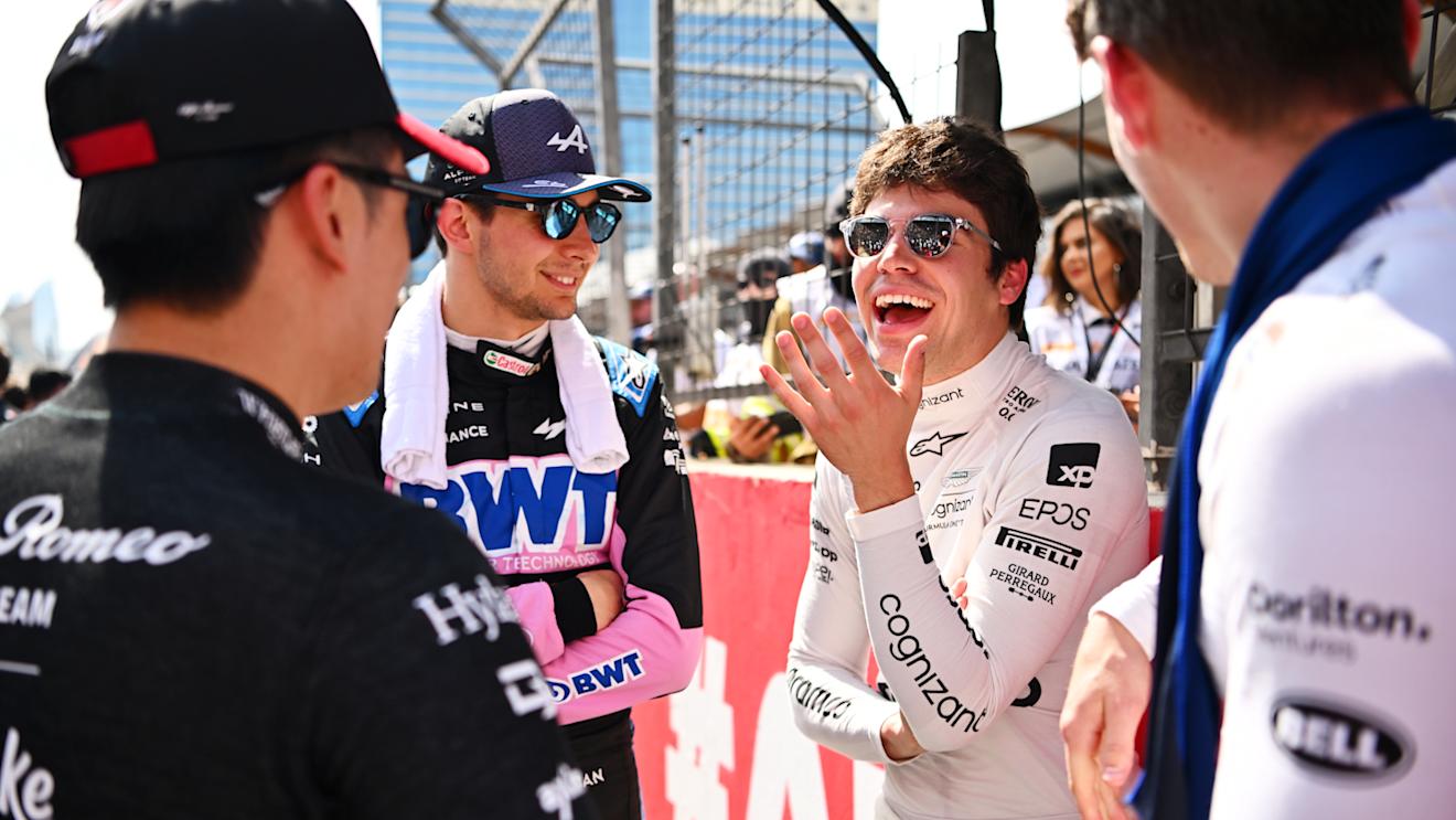 BAKU, AZERBAIJAN - APRIL 30: Lance Stroll of Canada and Aston Martin F1 Team, Logan Sargeant of United States and Williams, Zhou Guanyu of China and Alfa Romeo F1 and Esteban Ocon of France and Alpine F1 talk on the grid prior to the F1 Grand Prix of Azerbaijan at Baku City Circuit on April 30, 2023 in Baku, Azerbaijan. (Photo by Dan Mullan - Formula 1/Formula 1 via Getty Images)