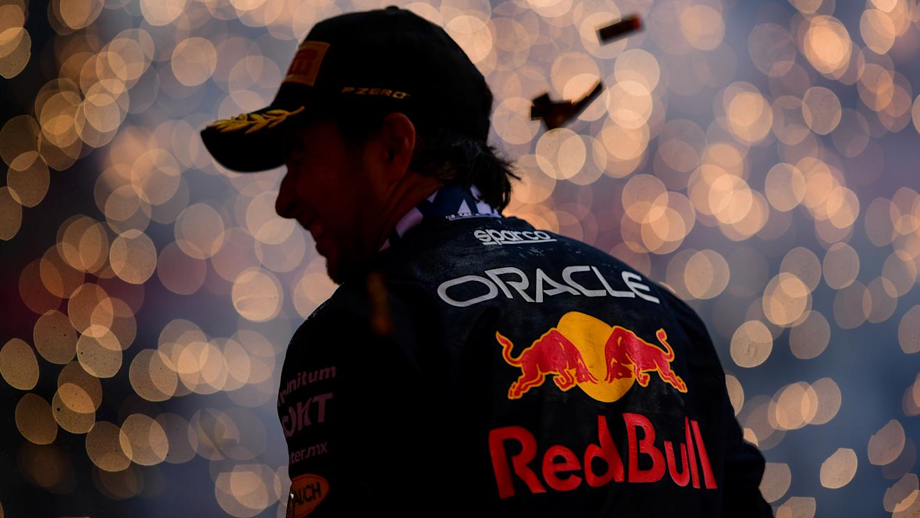 BAKU, AZERBAIJAN - APRIL 30: Race winner Sergio Perez of Mexico and Oracle Red Bull Racing celebrates on the podium during the F1 Grand Prix of Azerbaijan at Baku City Circuit on April 30, 2023 in Baku, Azerbaijan. (Photo by Mario Renzi - Formula 1/Formula 1 via Getty Images)