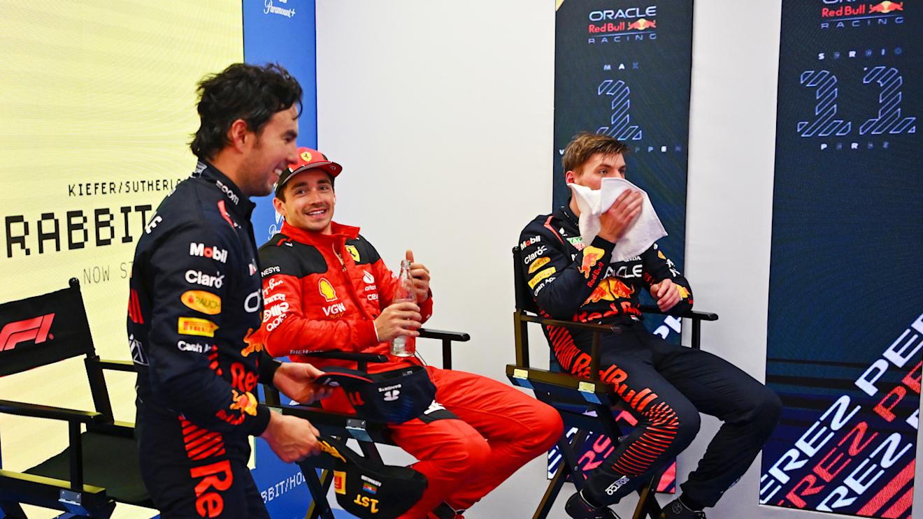 BAKU, AZERBAIJAN - APRIL 30: Race winner Sergio Perez of Mexico and Oracle Red Bull Racing (C) Third placed Charles Leclerc of Monaco and Ferrari (L) and Second placed Max Verstappen of the Netherlands and Oracle Red Bull Racing (R) talk ahead of the podium celebrations during the F1 Grand Prix of Azerbaijan at Baku City Circuit on April 30, 2023 in Baku, Azerbaijan. (Photo by Dan Mullan - Formula 1/Formula 1 via Getty Images)