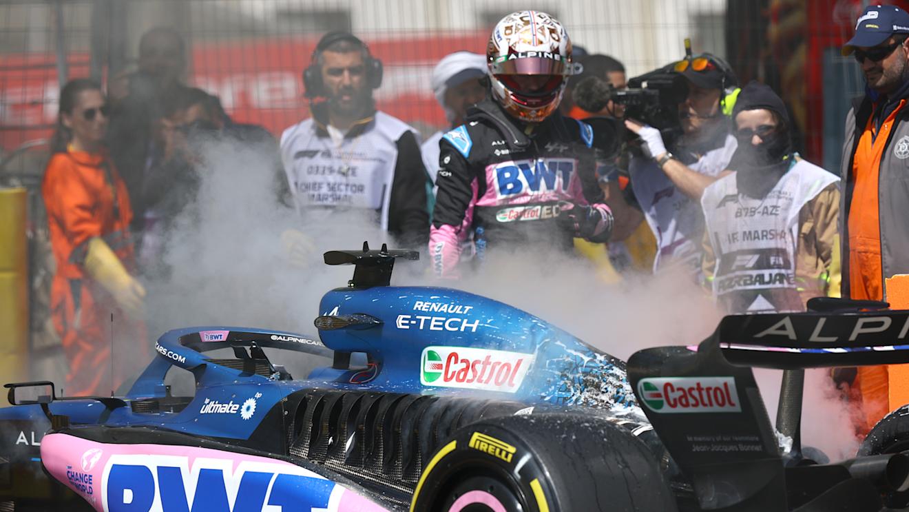 BAKU, AZERBAIJAN - APRIL 28: Pierre Gasly of France and Alpine F1 looks on as the fire in his car is put out during practice ahead of the F1 Grand Prix of Azerbaijan at Baku City Circuit on April 28, 2023 in Baku, Azerbaijan. (Photo by Francois Nel/Getty Images)